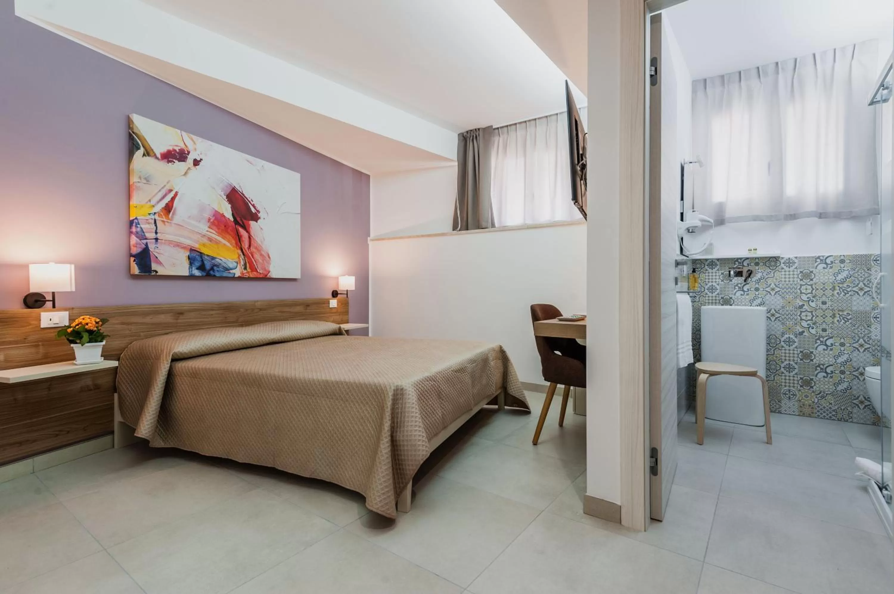 Bed in Archimede's Rooms