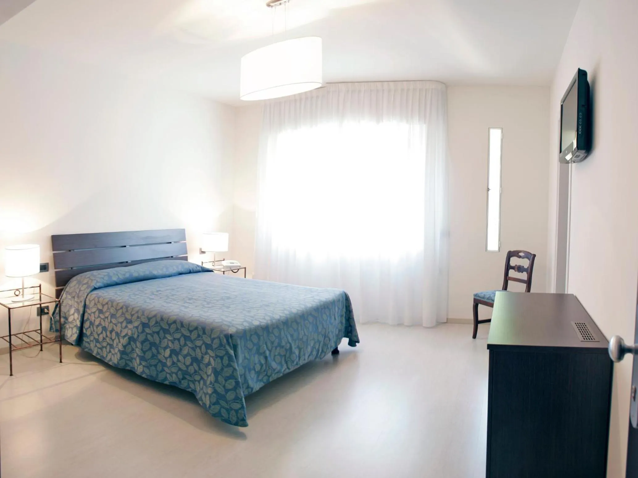 Photo of the whole room, Bed in Hotel Sorriso