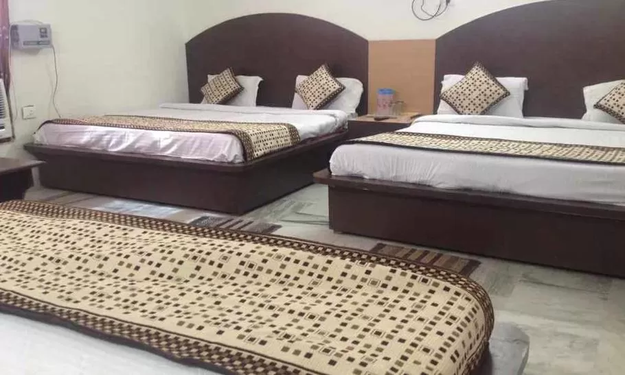 Bedroom, Bed in Trimrooms @ Katra Railway Station