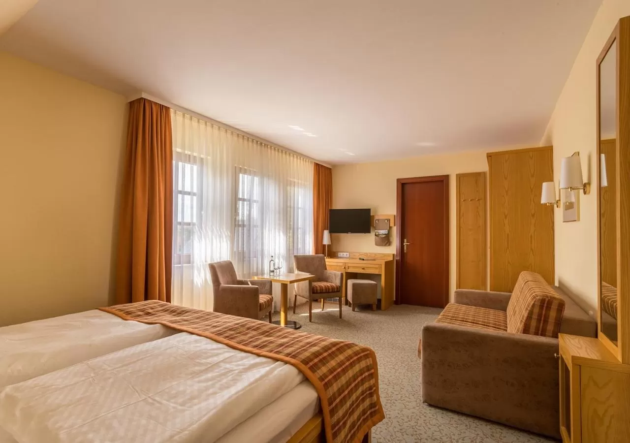 Photo of the whole room, Bed in Ringhotel Warnemünder Hof