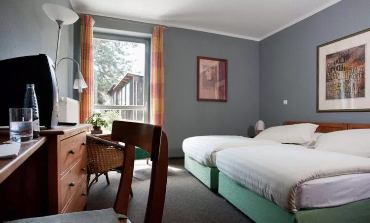 Photo of the whole room, Bed in Landhaus Tonmühle