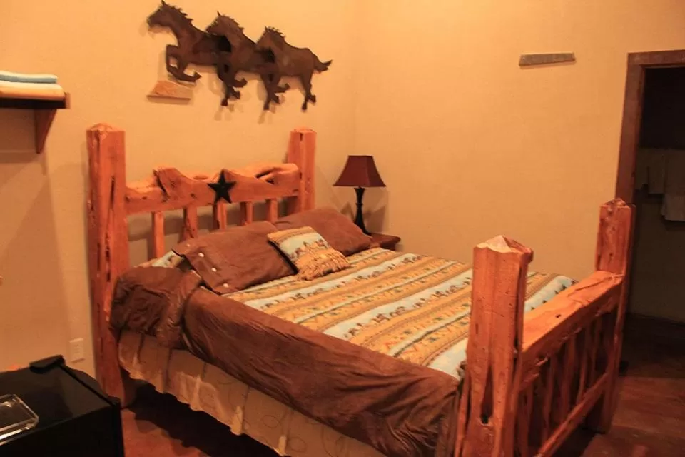 Bed in Flying L Ranch Resort & Golf Course