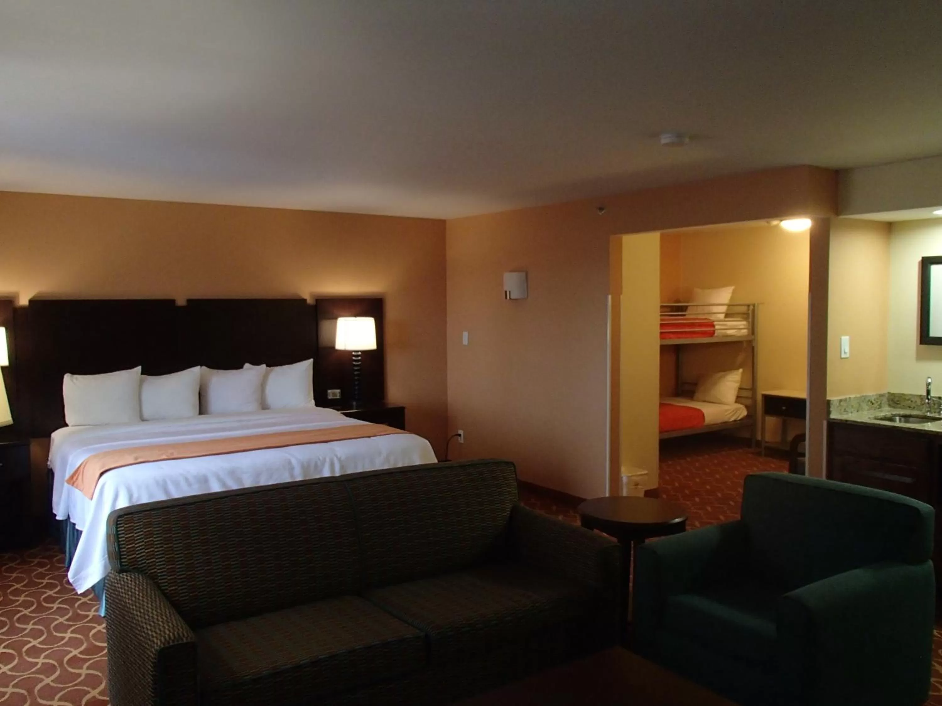 Bed in Lux Hotel & Spa, Trademark Collection by Wyndham