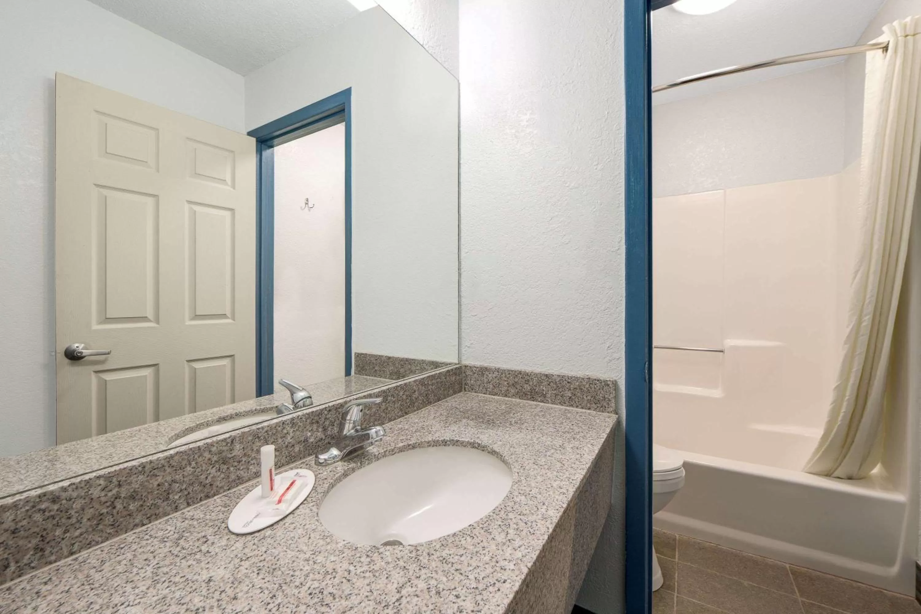 Bathroom in Super 8 by Wyndham Dumas TX