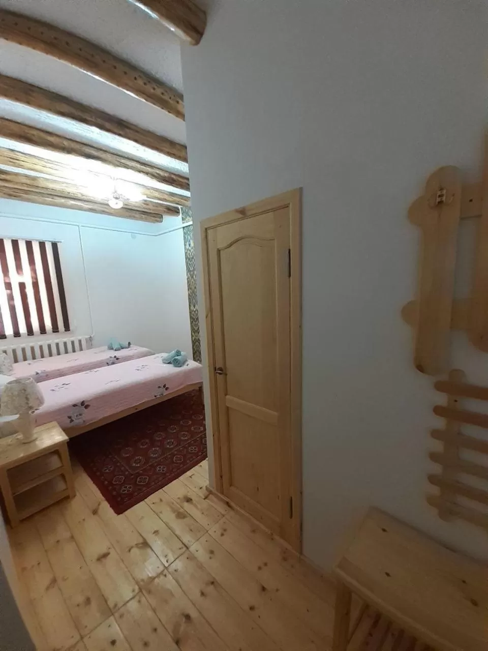 Bed in KHIVA ABDULLA Guest House