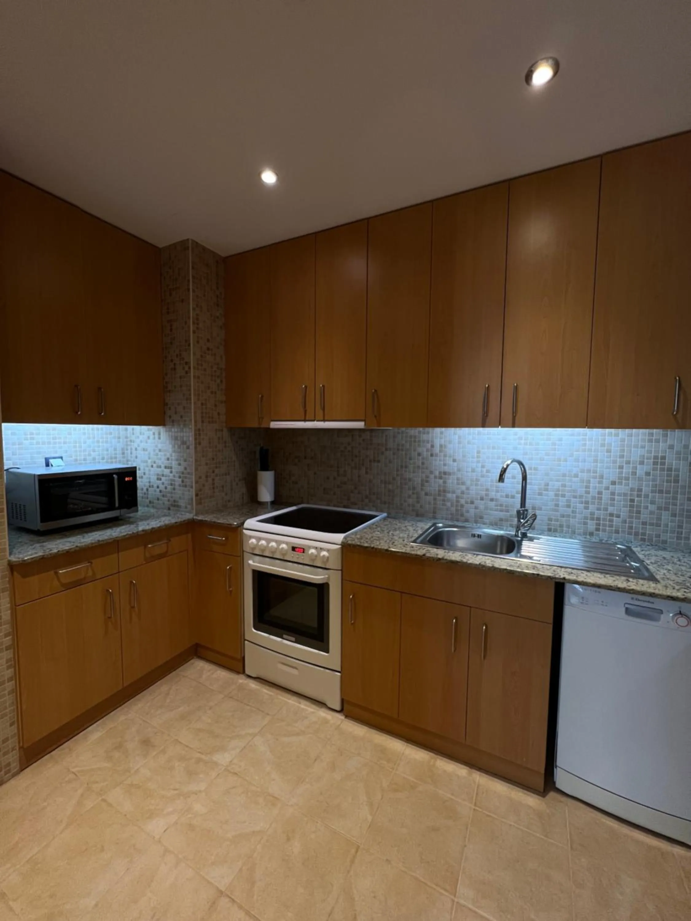 Kitchen or kitchenette in Atyrau Executive Apartments