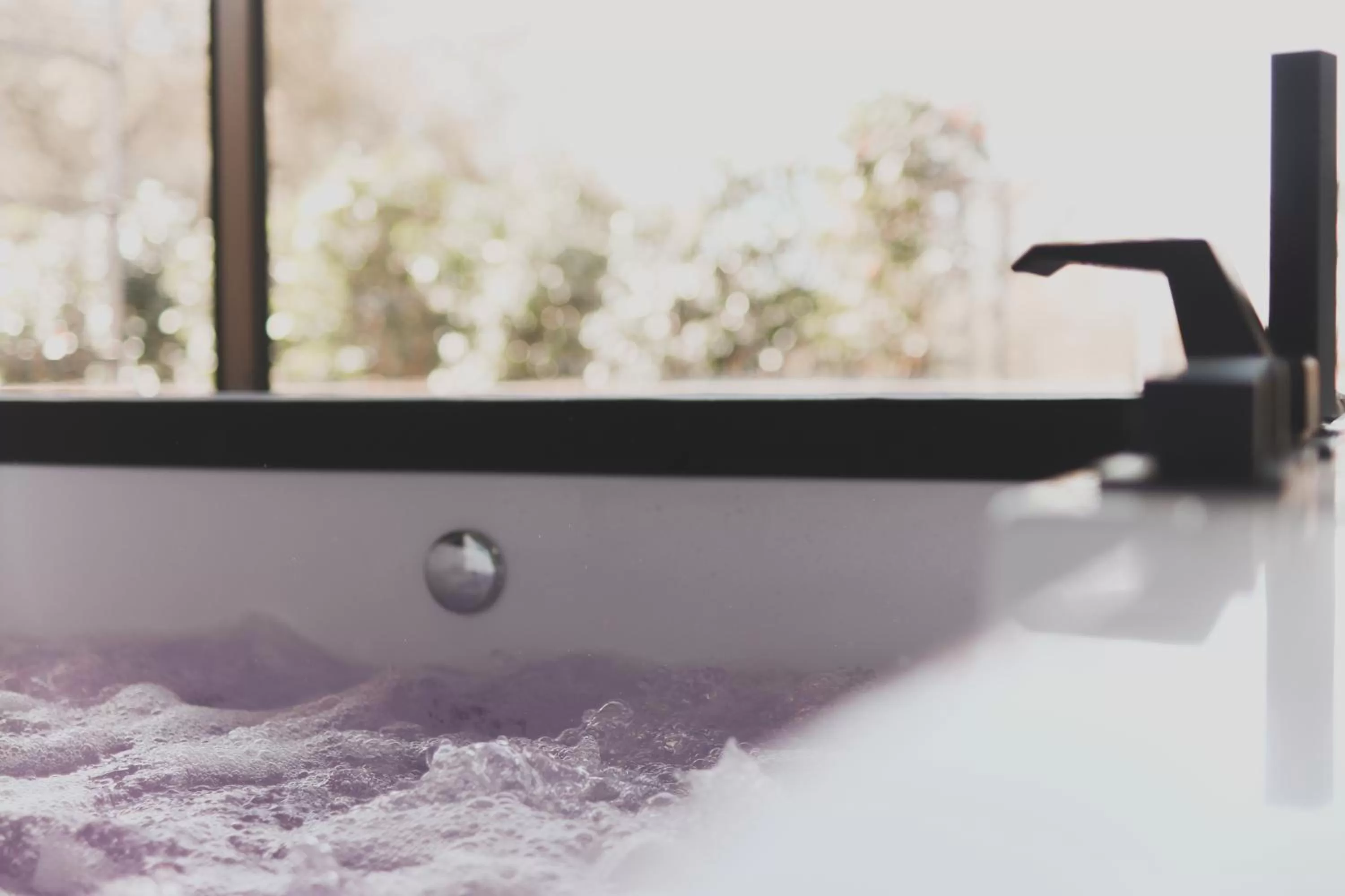 Hot Tub in Atmos Hotel Boutique