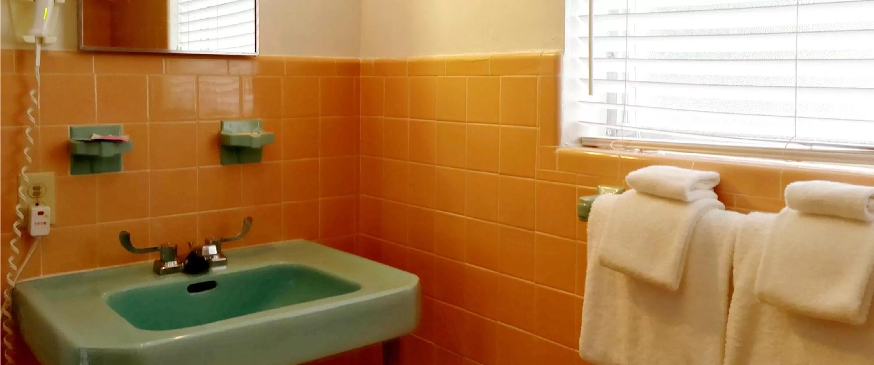 Bathroom in Manhattan Tower Apartment Hotel