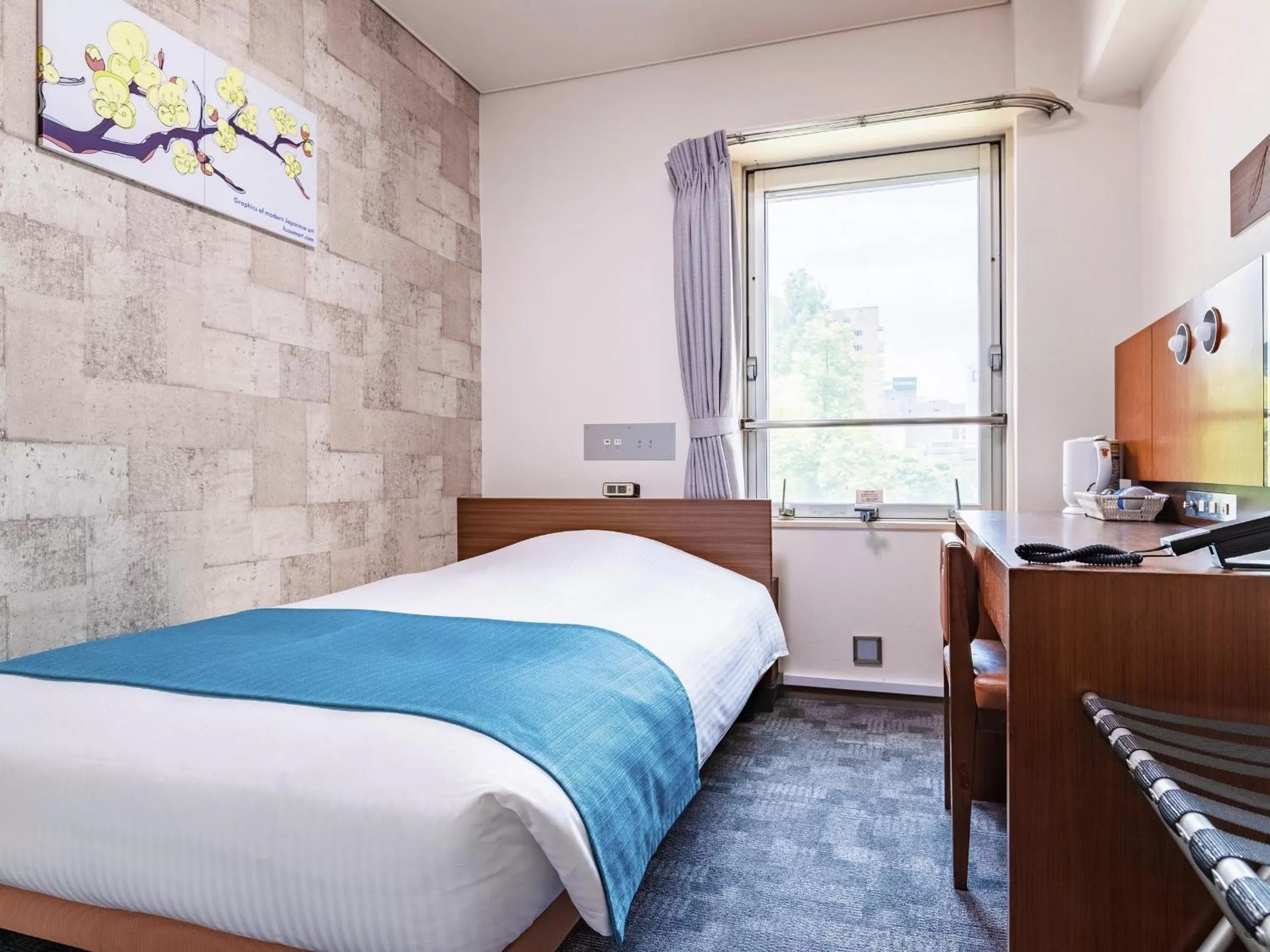 Bed in Central Hotel Okayama