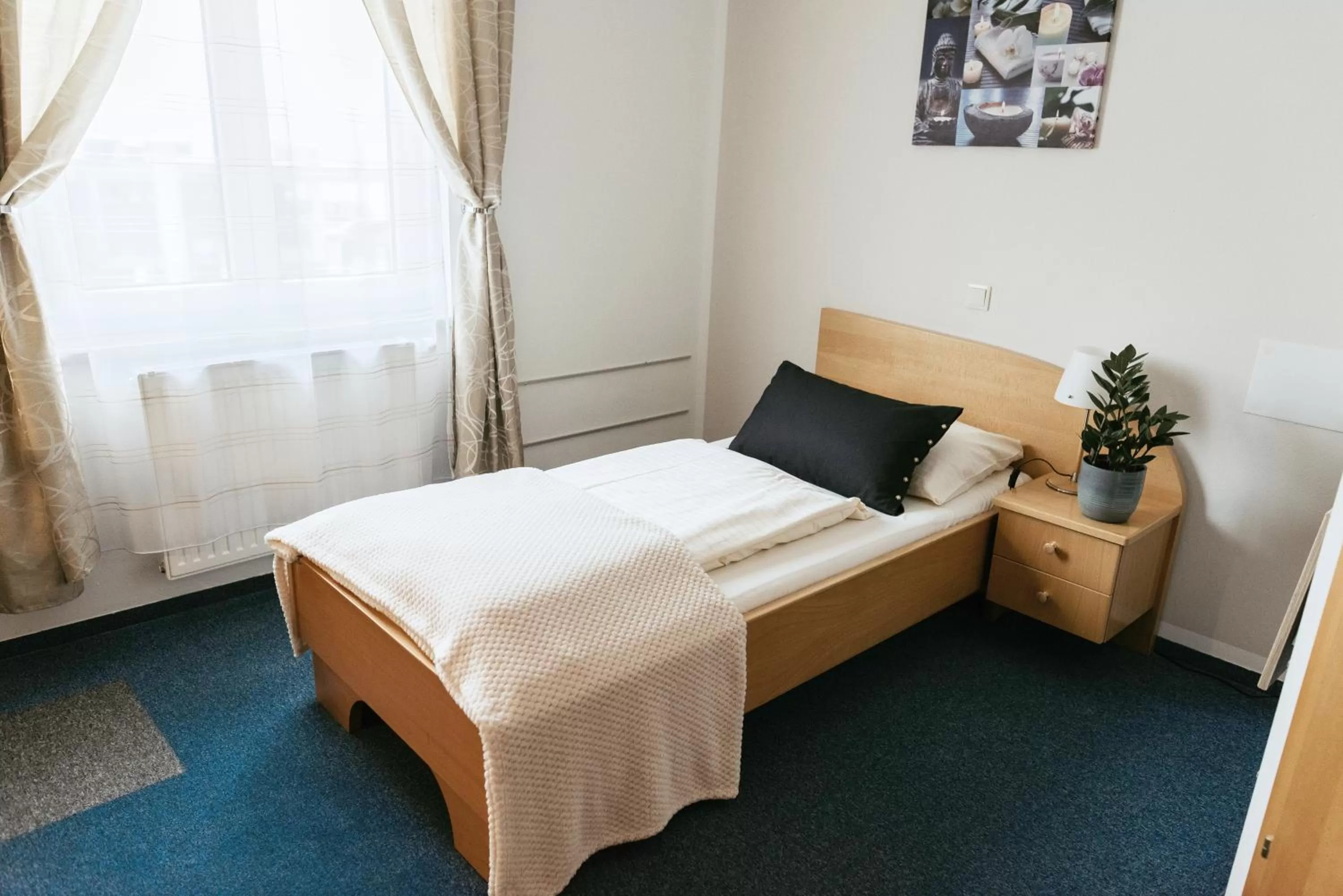 Bed in Restaurant Gästehaus Feldkirchen