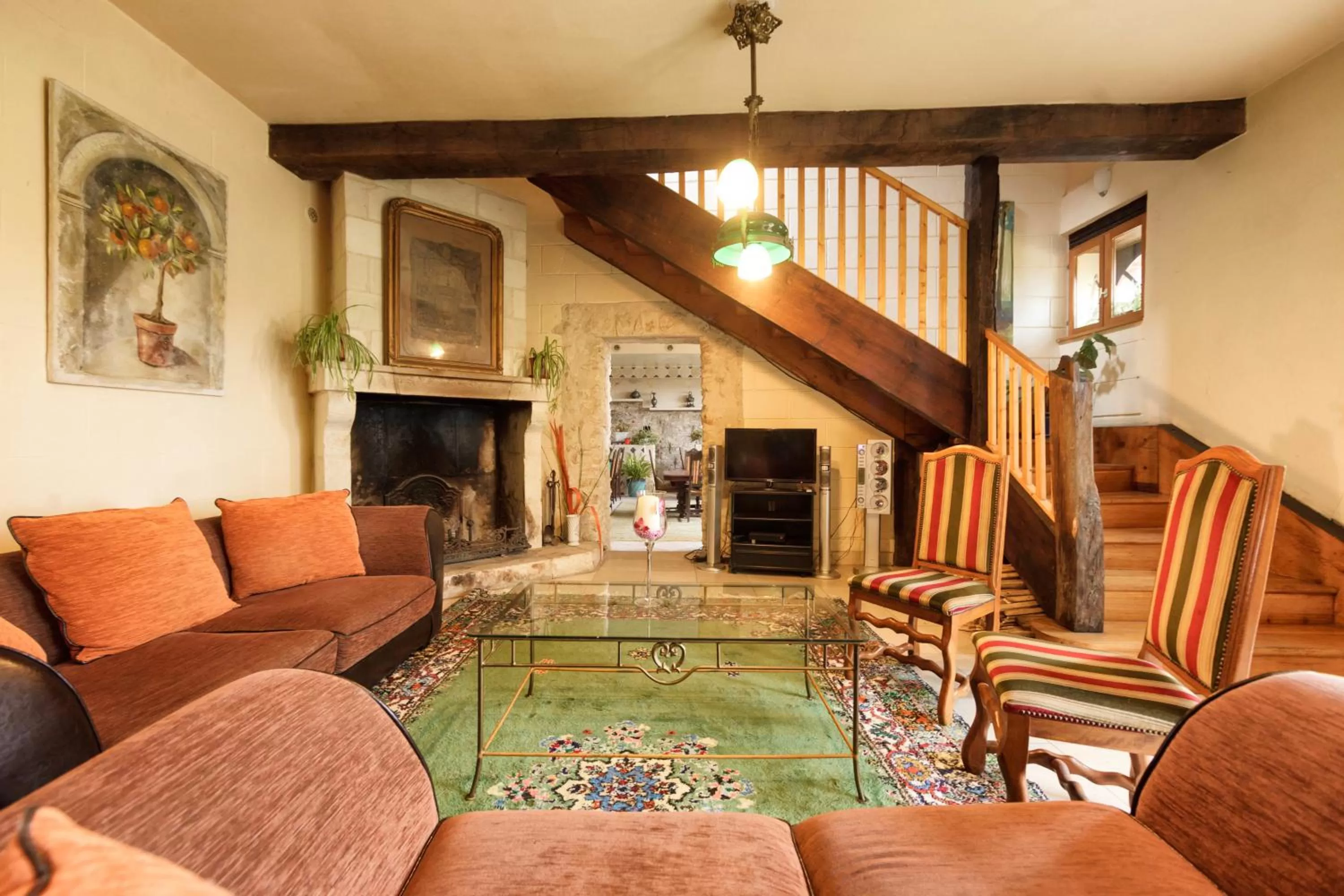 Communal lounge/ TV room in Château du Jard