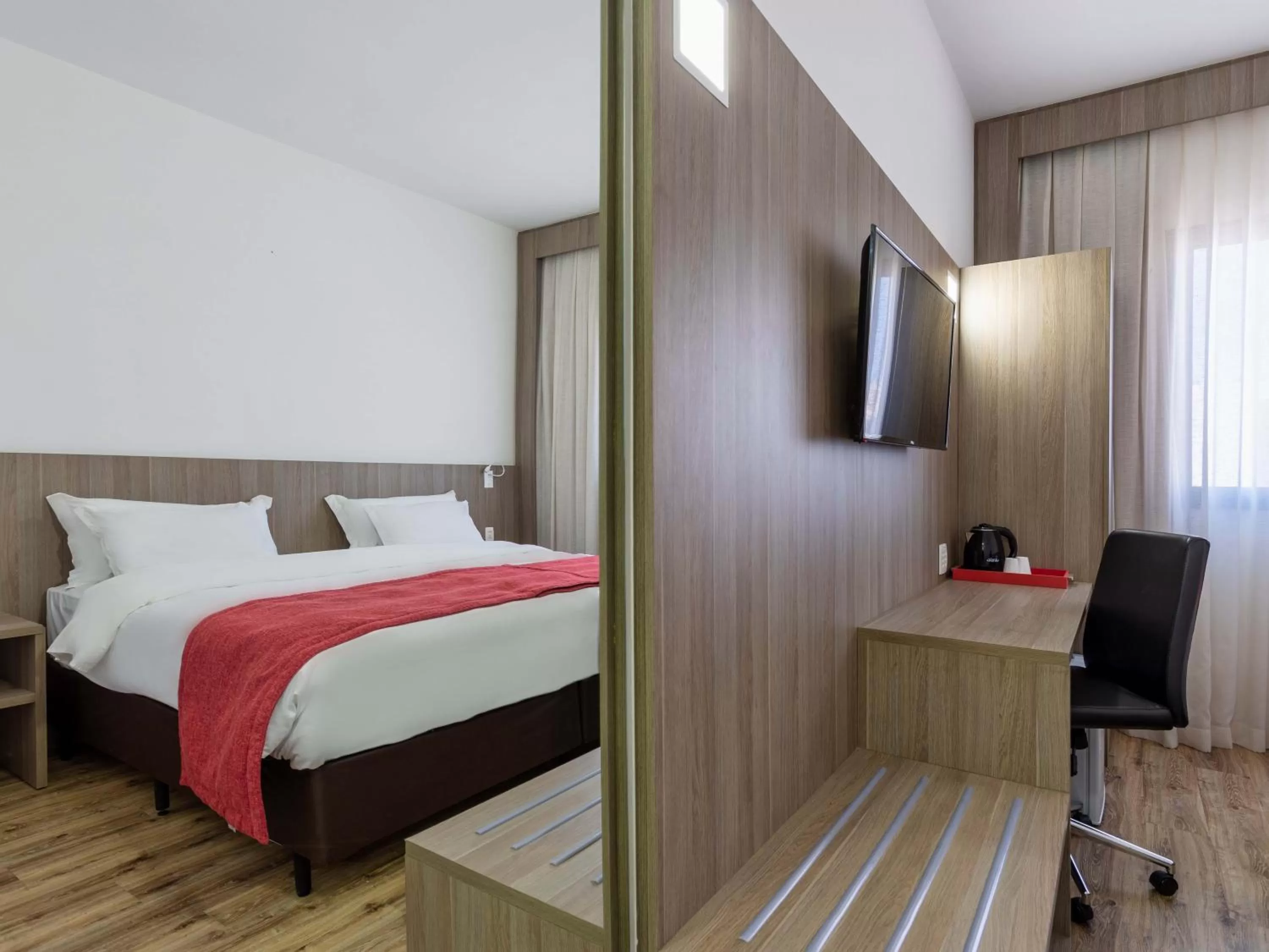 Bed in Ramada Encore by Wyndham São Paulo Osasco