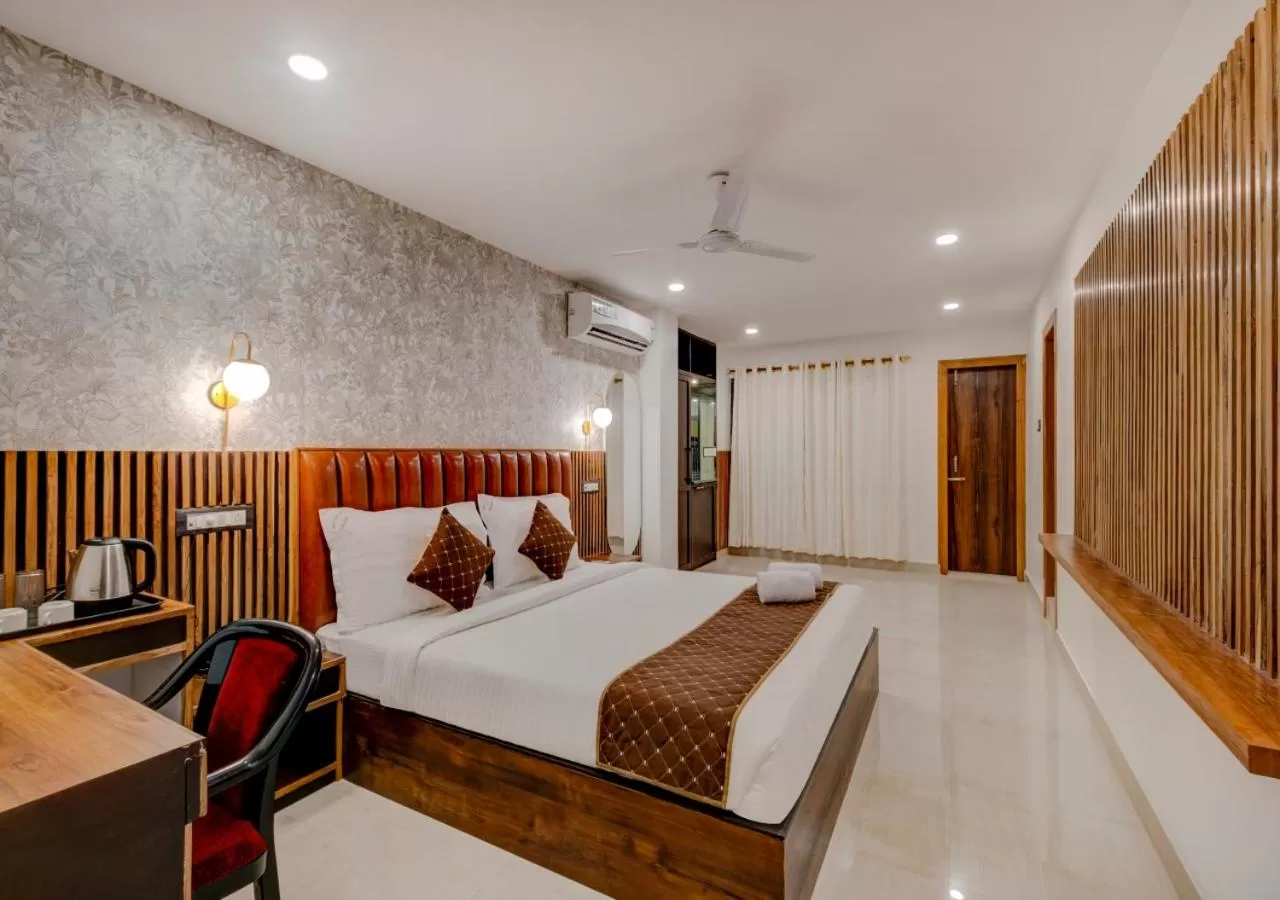 Bed in Hotel Sai Rain Tree