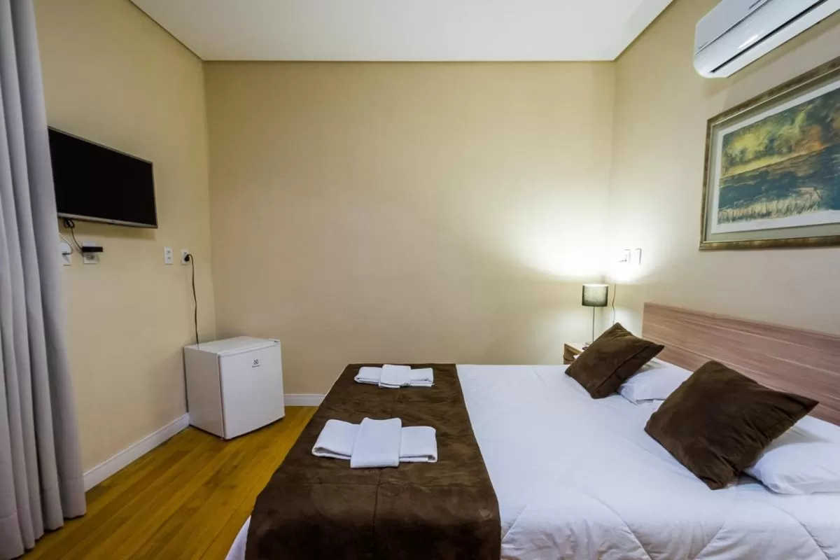 Bed in Hotel Praça da Matriz