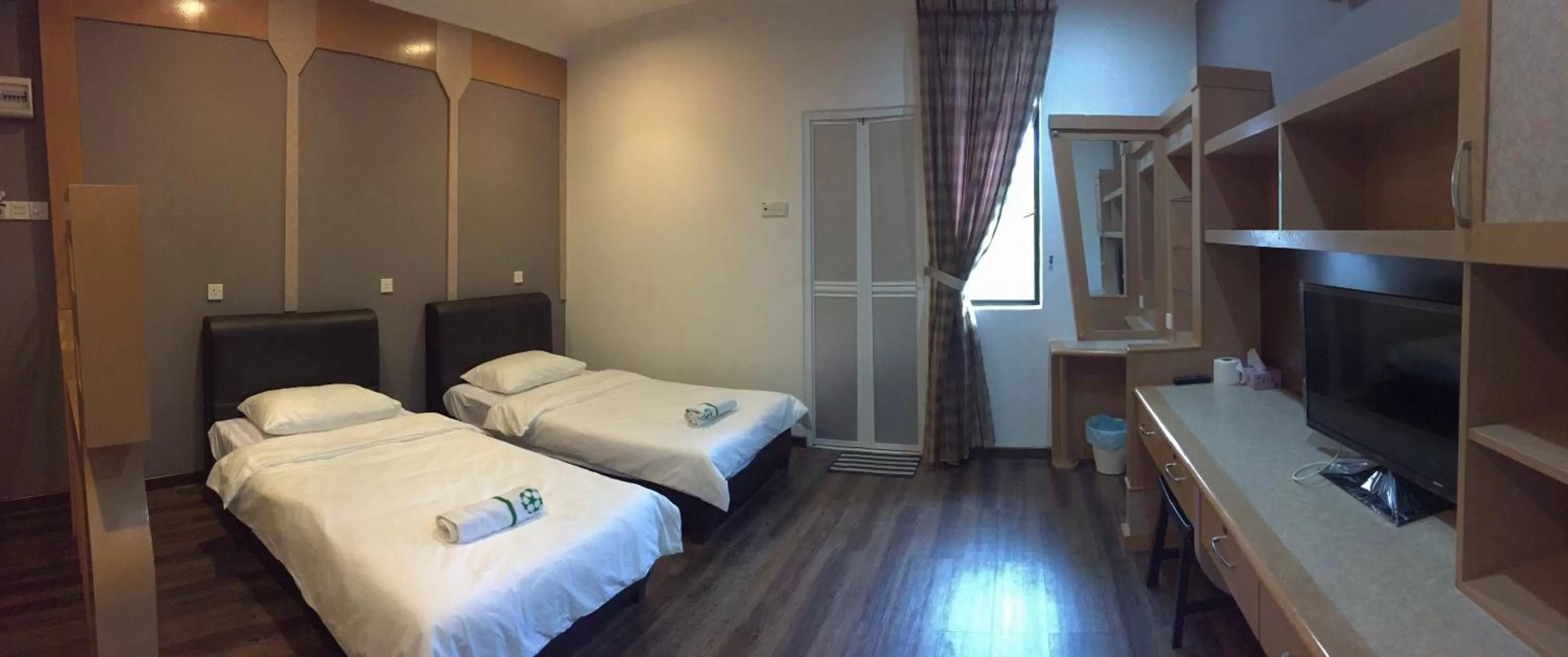 Photo of the whole room, Bed in Homestay Muar