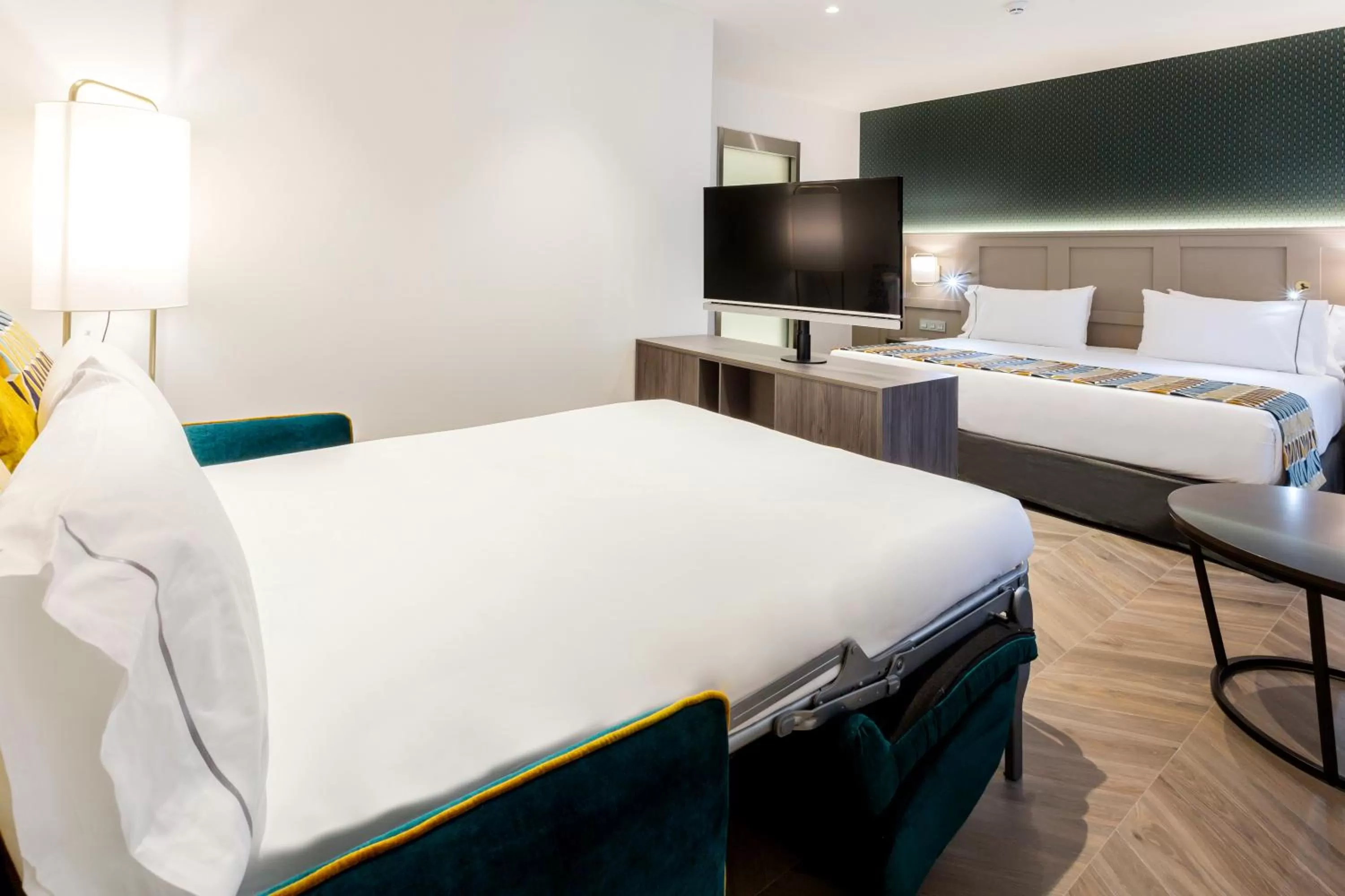 Photo of the whole room, Bed in Eurostars Puerta Real