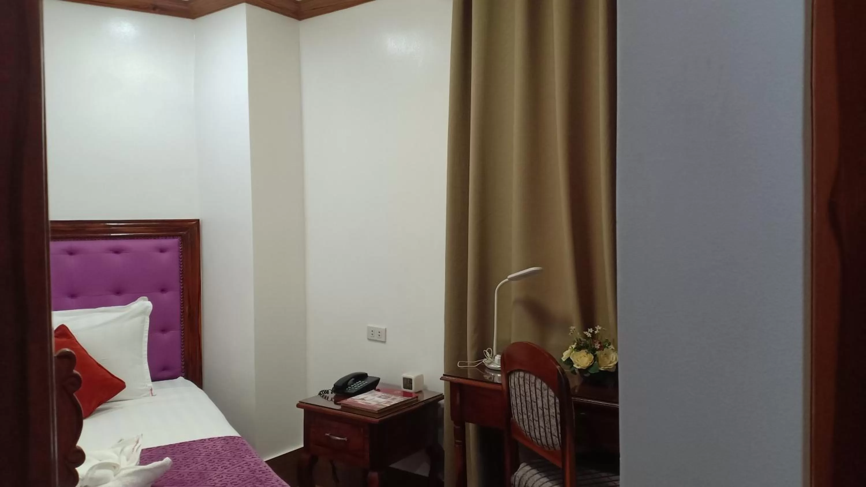 Bed in CLN Boutique Hotel