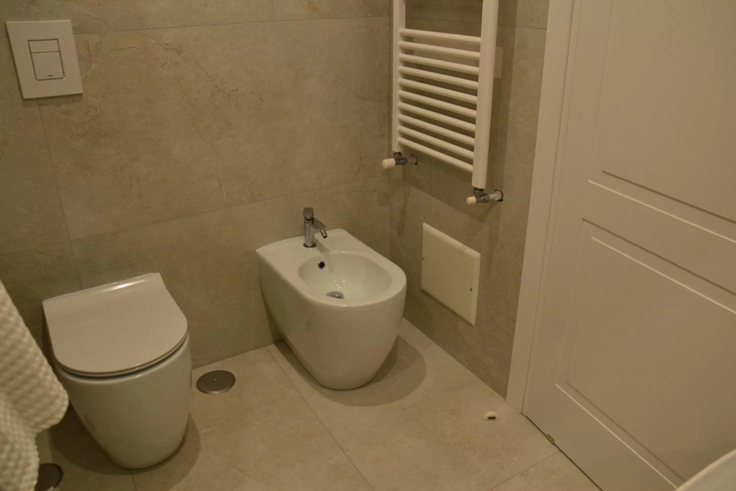 Toilet, Bathroom in Luna Nuova Suites