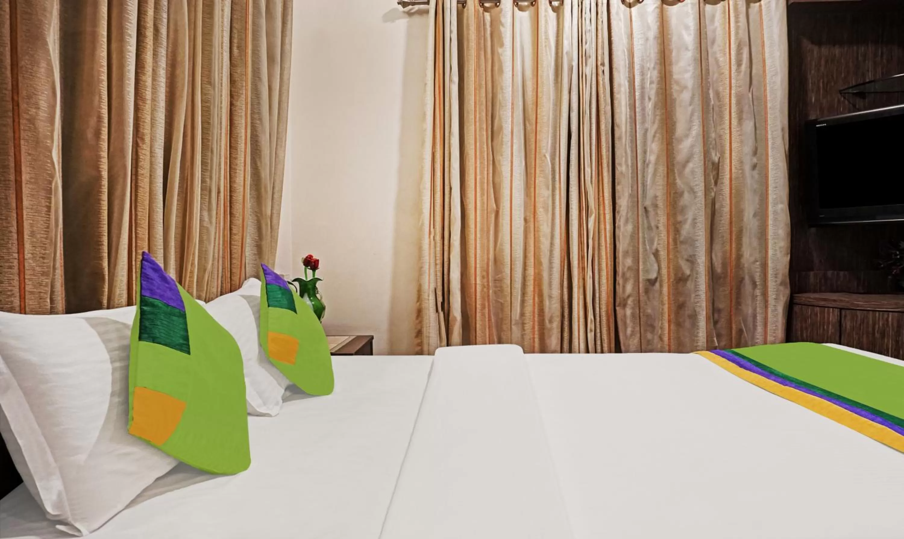 Bedroom, Bed in Treebo Excellent Home