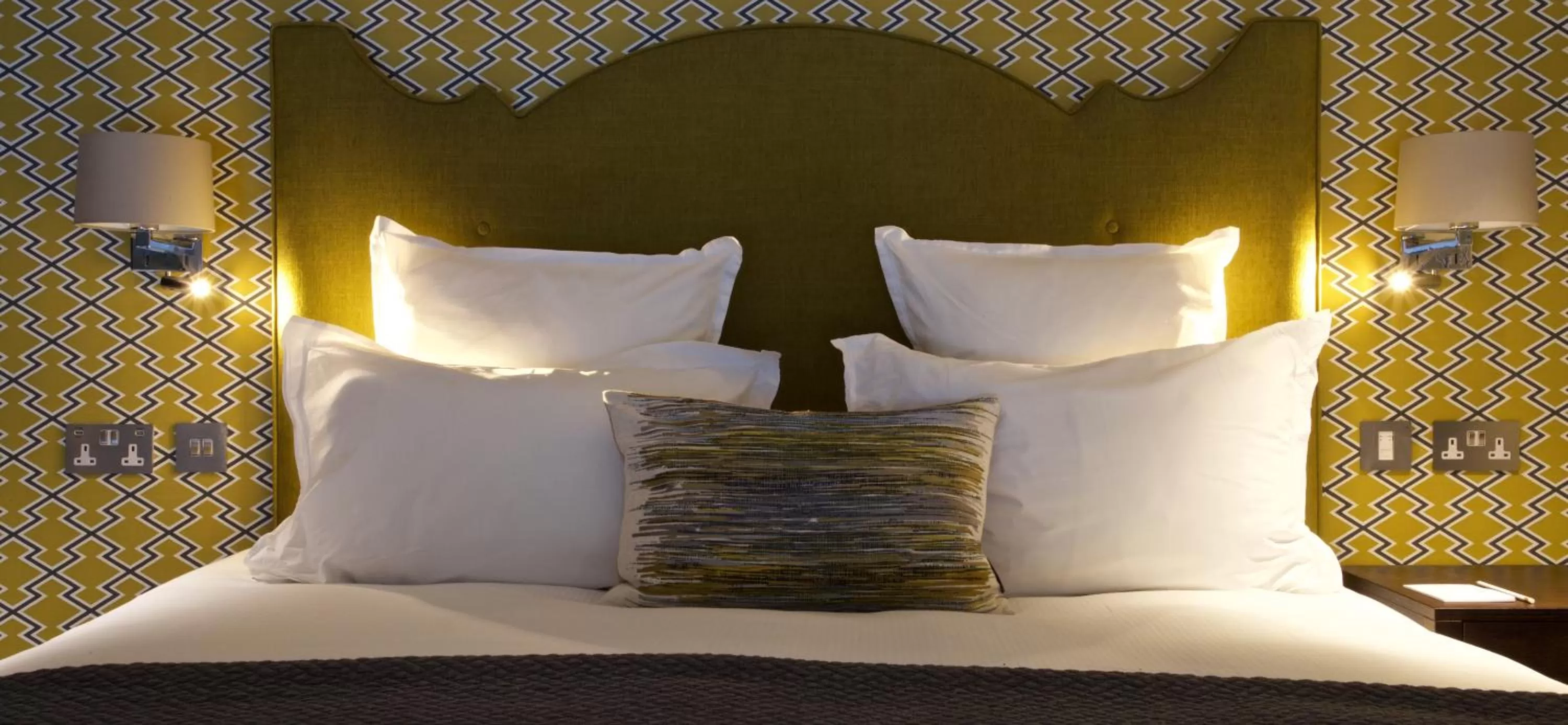 Bed in 54 Queen's Gate Hotel