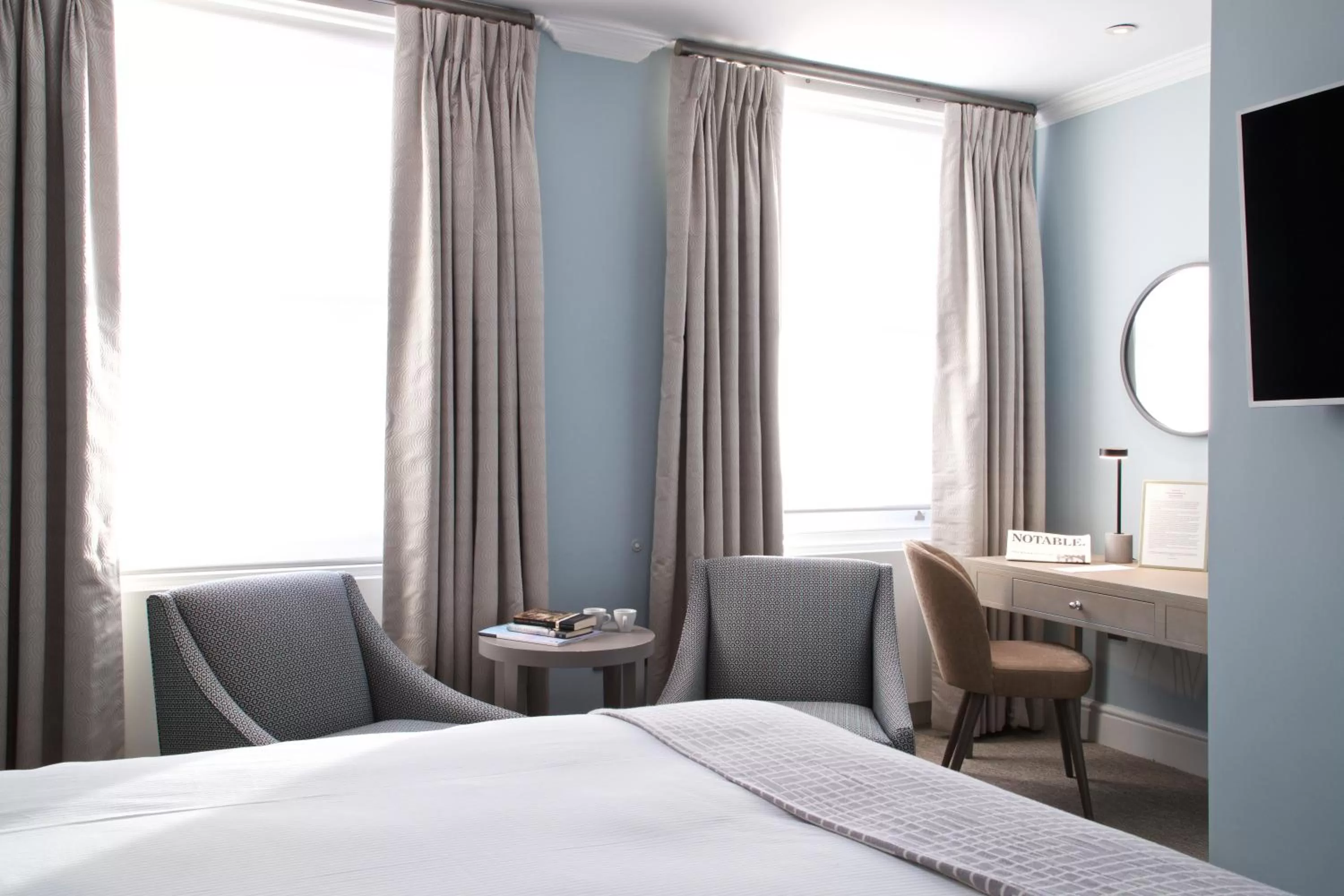 Bed in 54 Queen's Gate Hotel