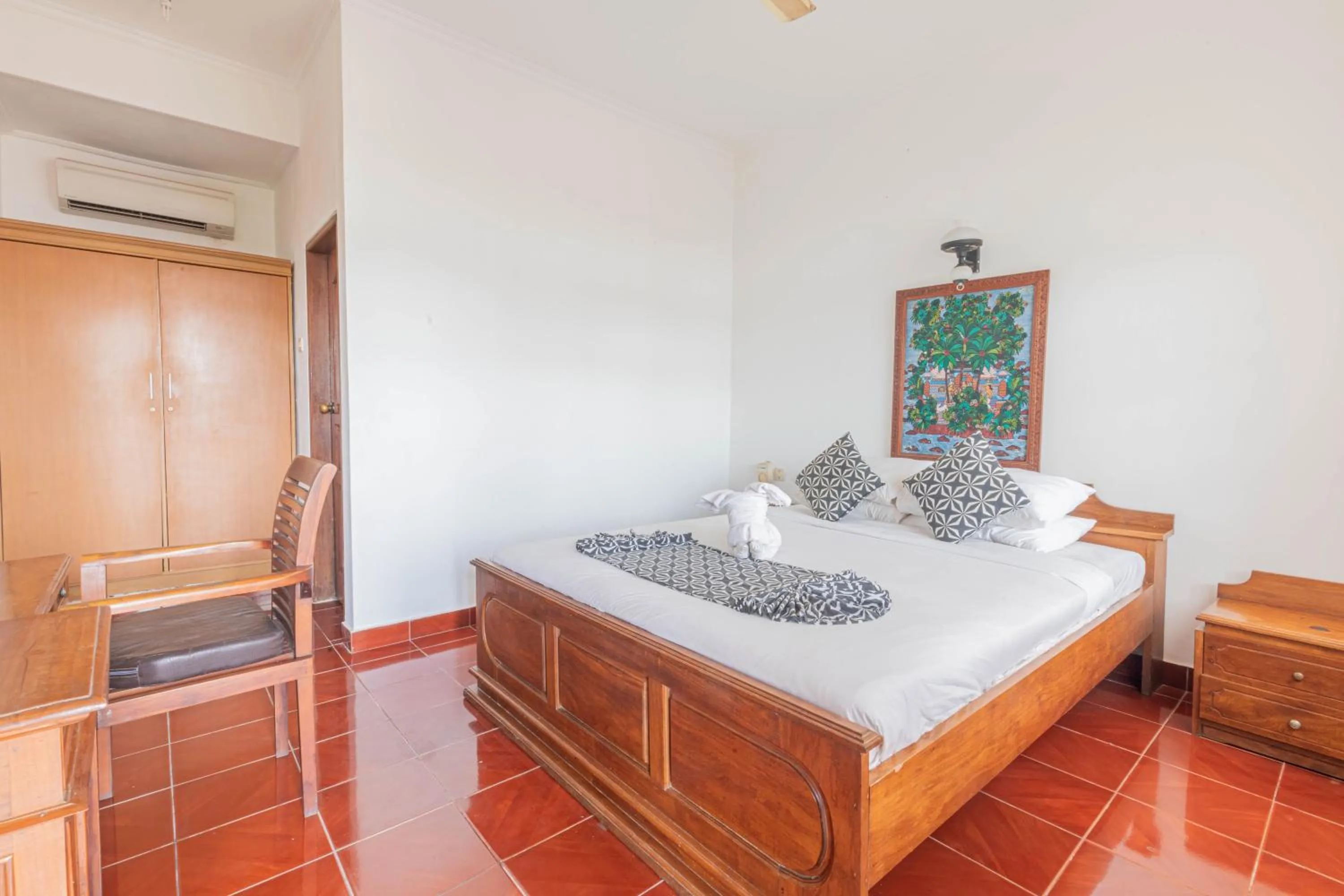 Bedroom in Puri Mango Guest House Sanur