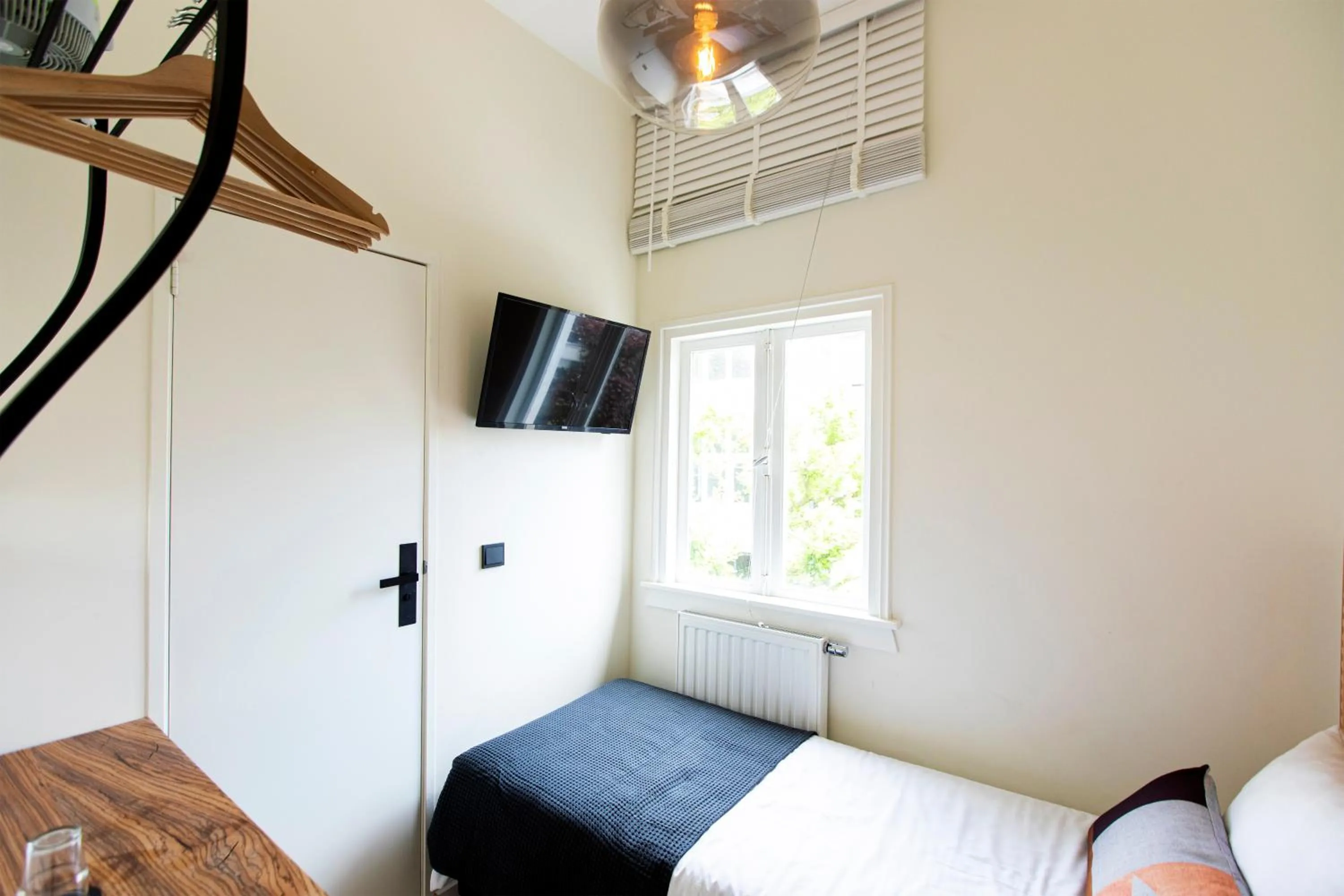 Bed in Quentin Golden Bear Hotel