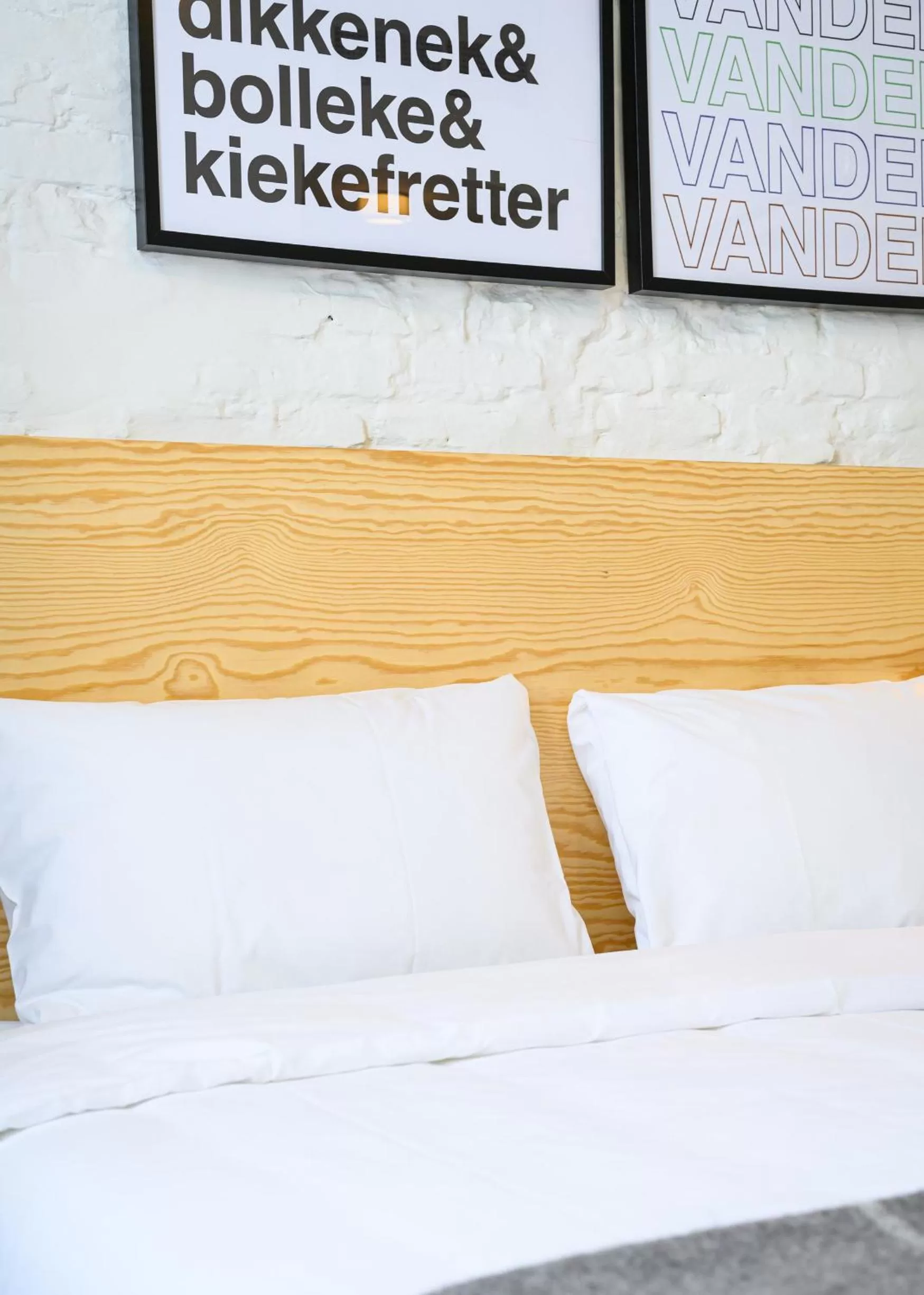 Bed in Hotel La Grande Cloche