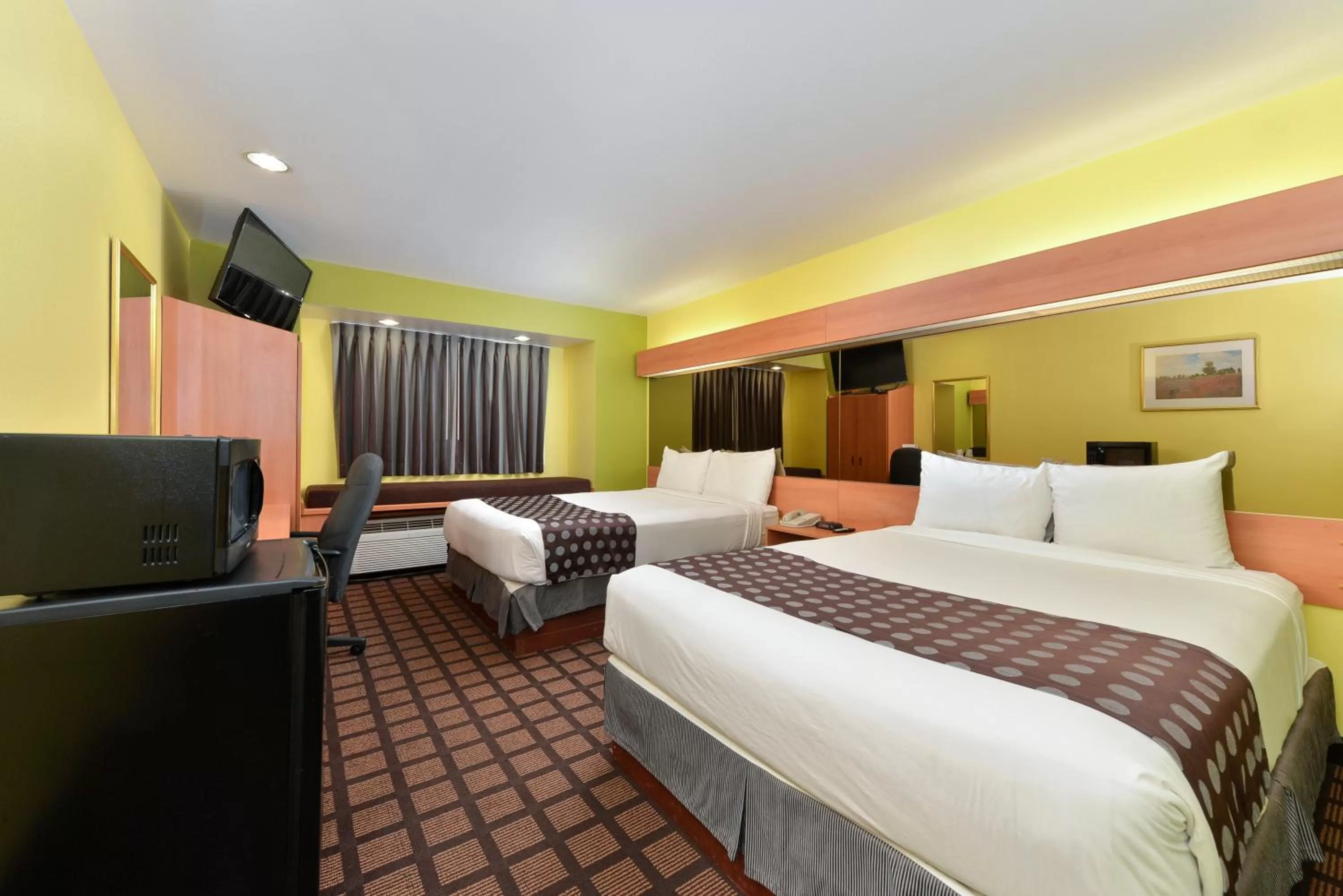 Photo of the whole room, Bed in Microtel Inn & Suites by Wyndham Ft. Worth North/At Fossil