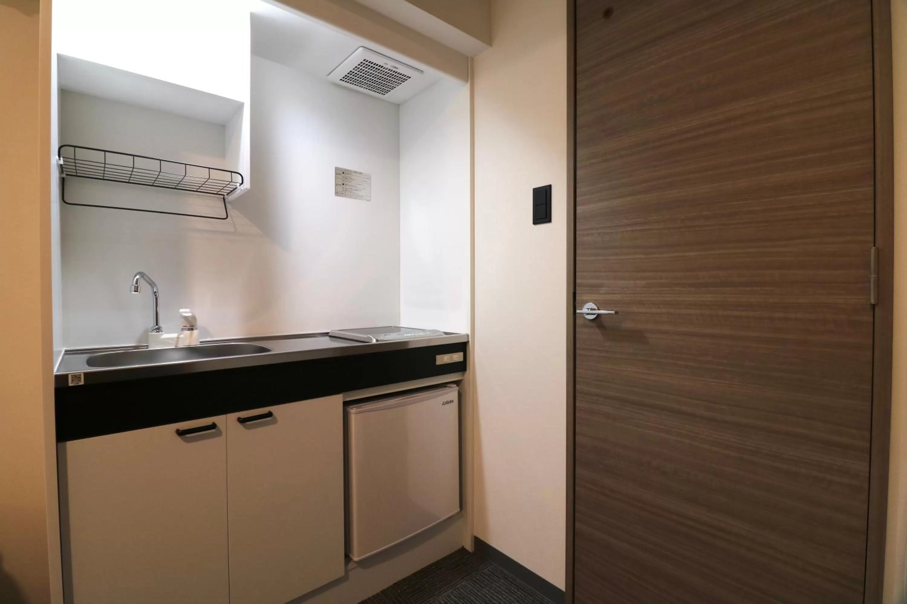Kitchen or kitchenette in TAKETO STAY PREMIERE SAPPORO Eki