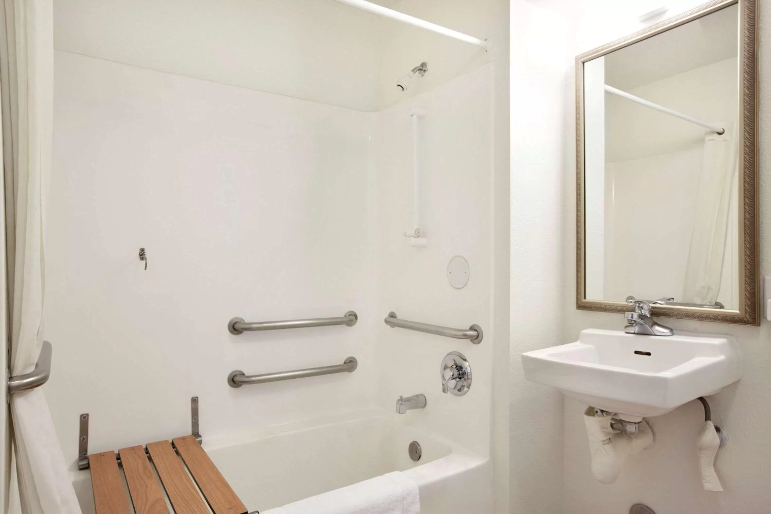 Bathroom in Super 8 by Wyndham Garland Rowlett East Dallas Area