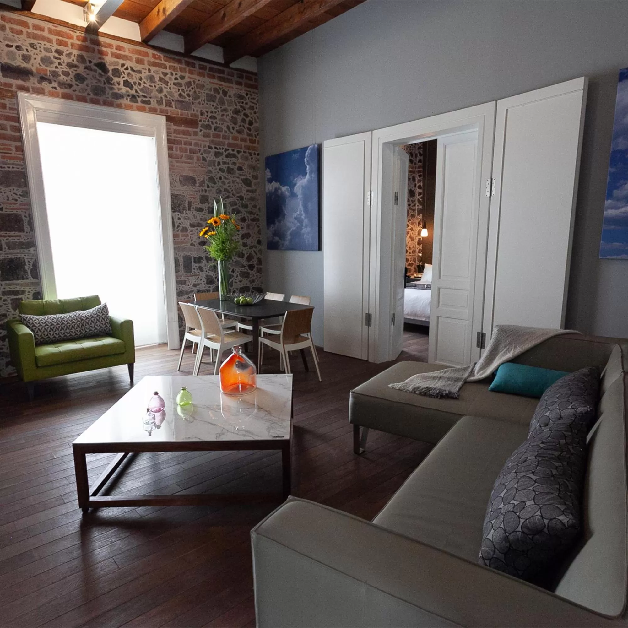 Communal lounge/ TV room in Mumedi Design Hotel