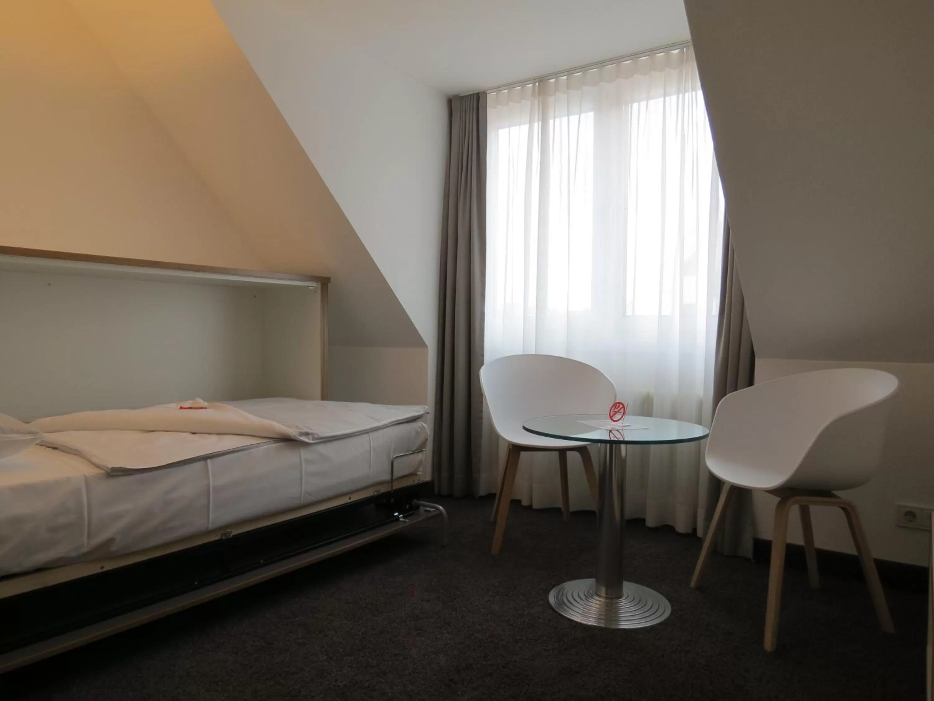 Bed in Comfor Hotel Ulm City