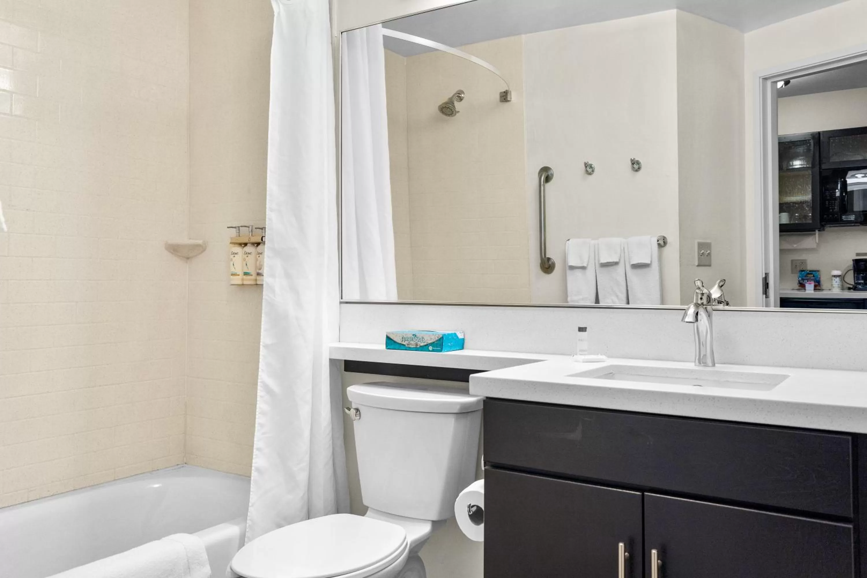 Toilet in Candlewood Suites Erie by IHG