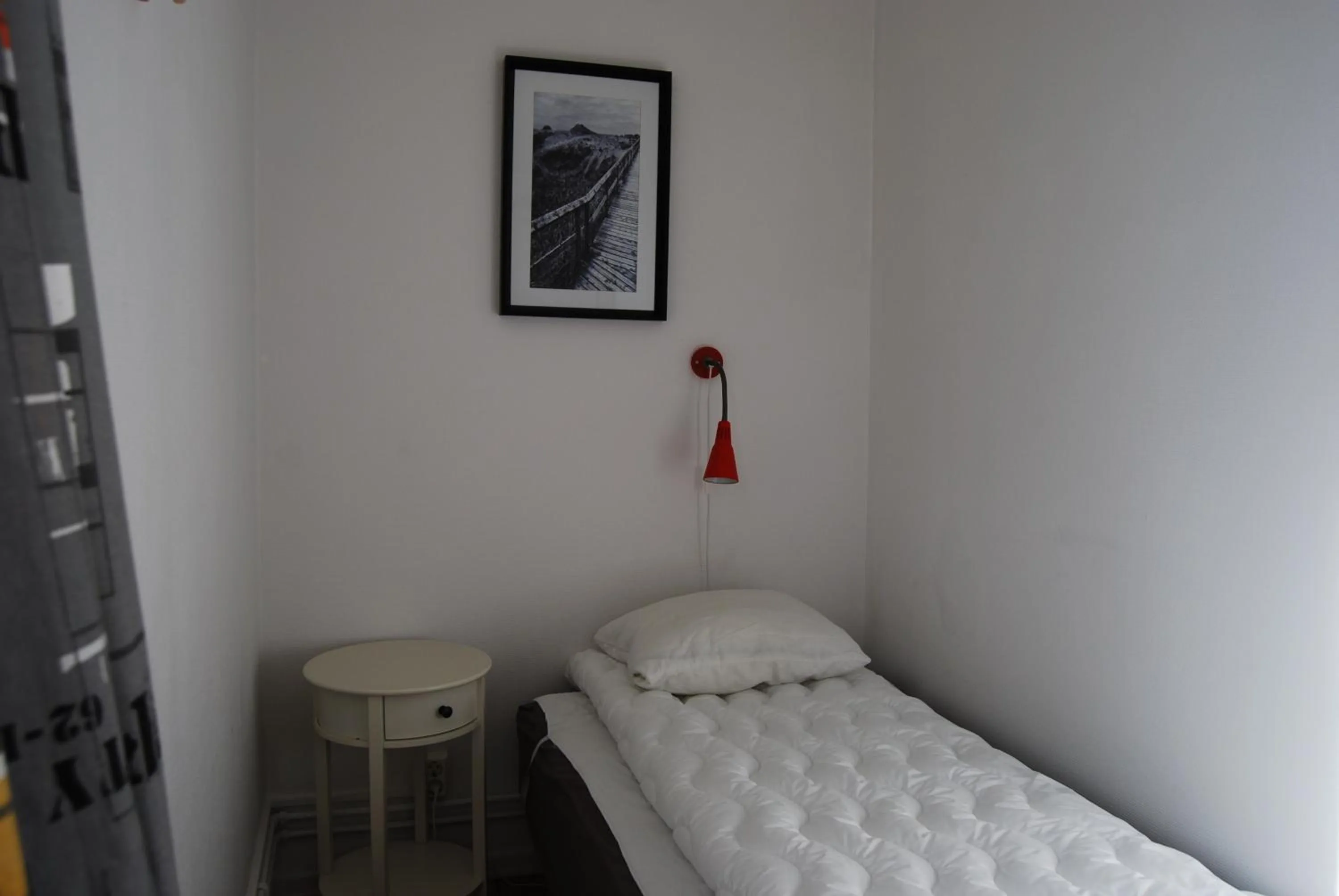 Bed in Halmstad Hotell & Vandrarhem Kaptenshamn