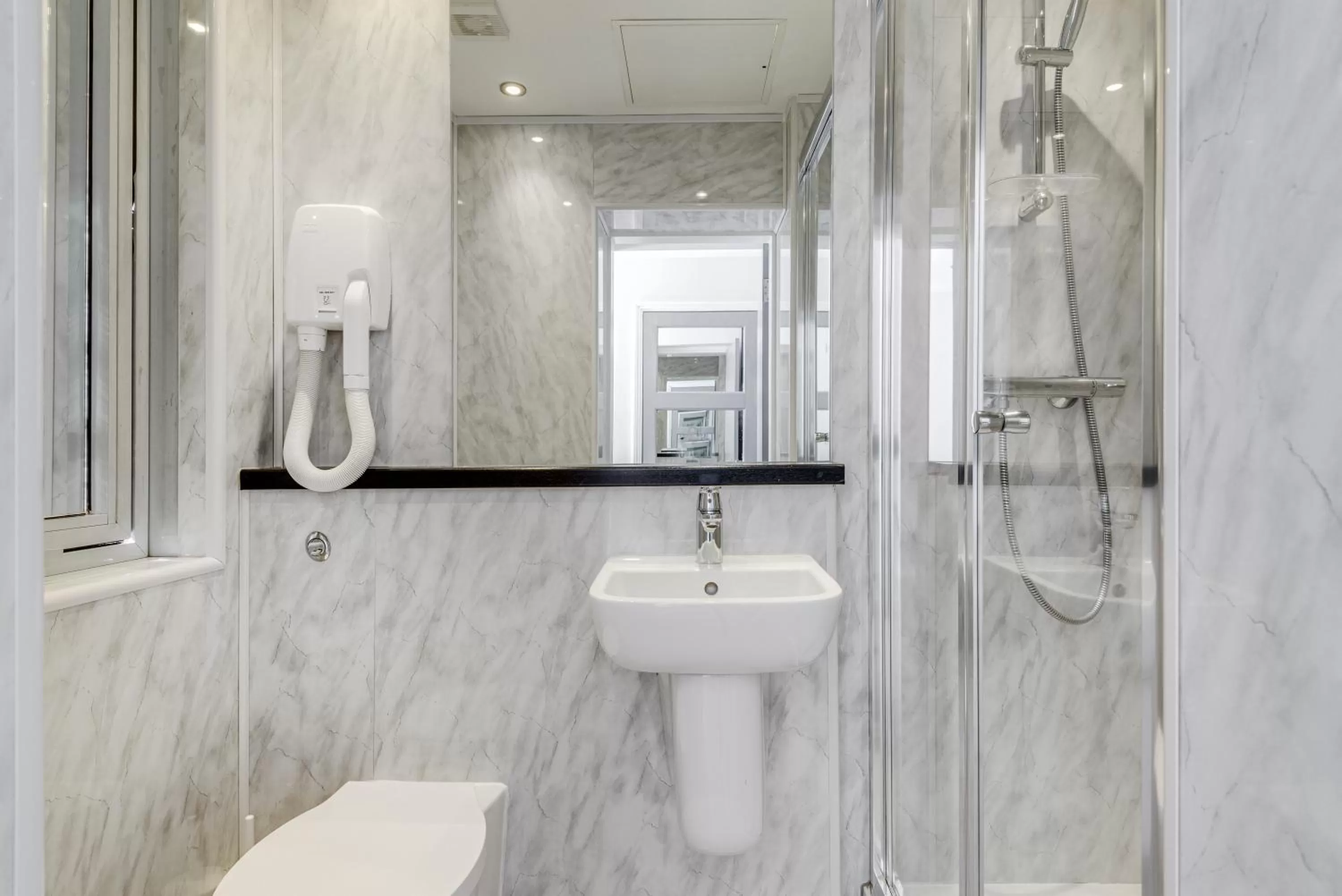 Shower in 1 Lexham Gardens Hotel