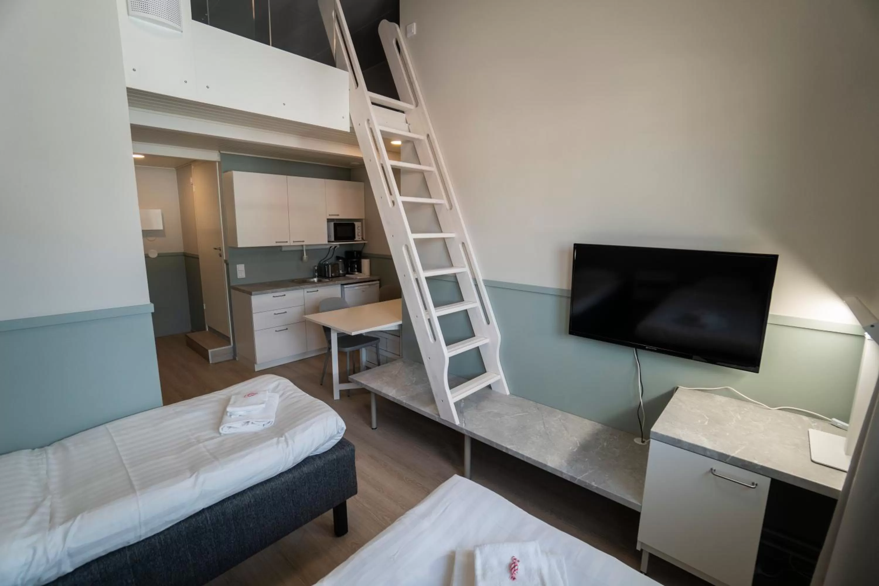 Bed in Innotelli Apartments