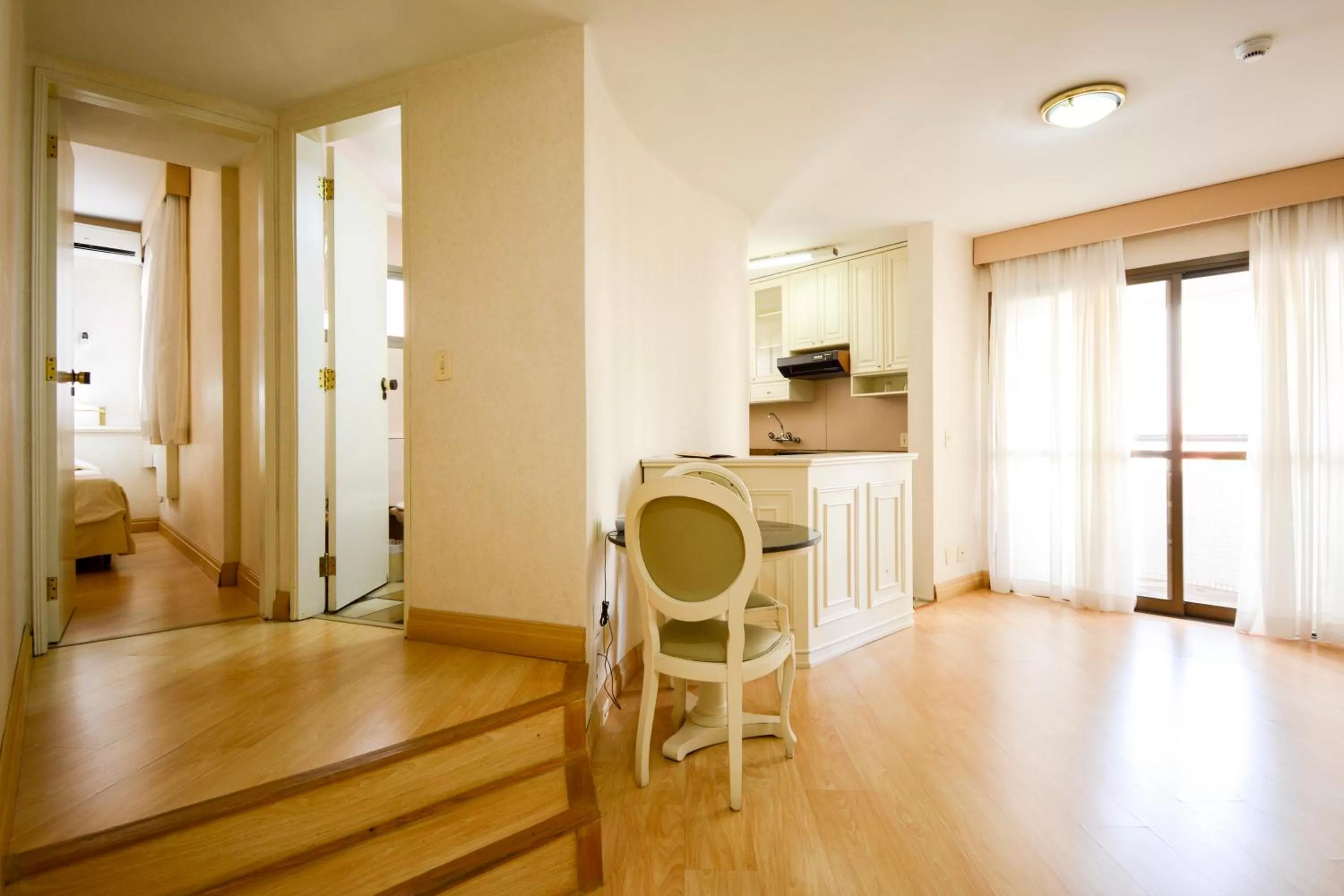 Kitchen or kitchenette, Dining Area in Wall Street Apartments by BnbHost