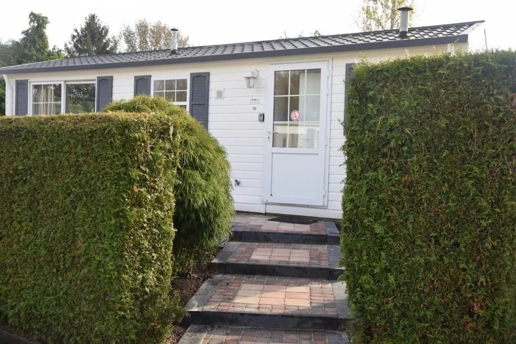 Facade/entrance, Property Building in Chalet Heggemus Oisterwijk