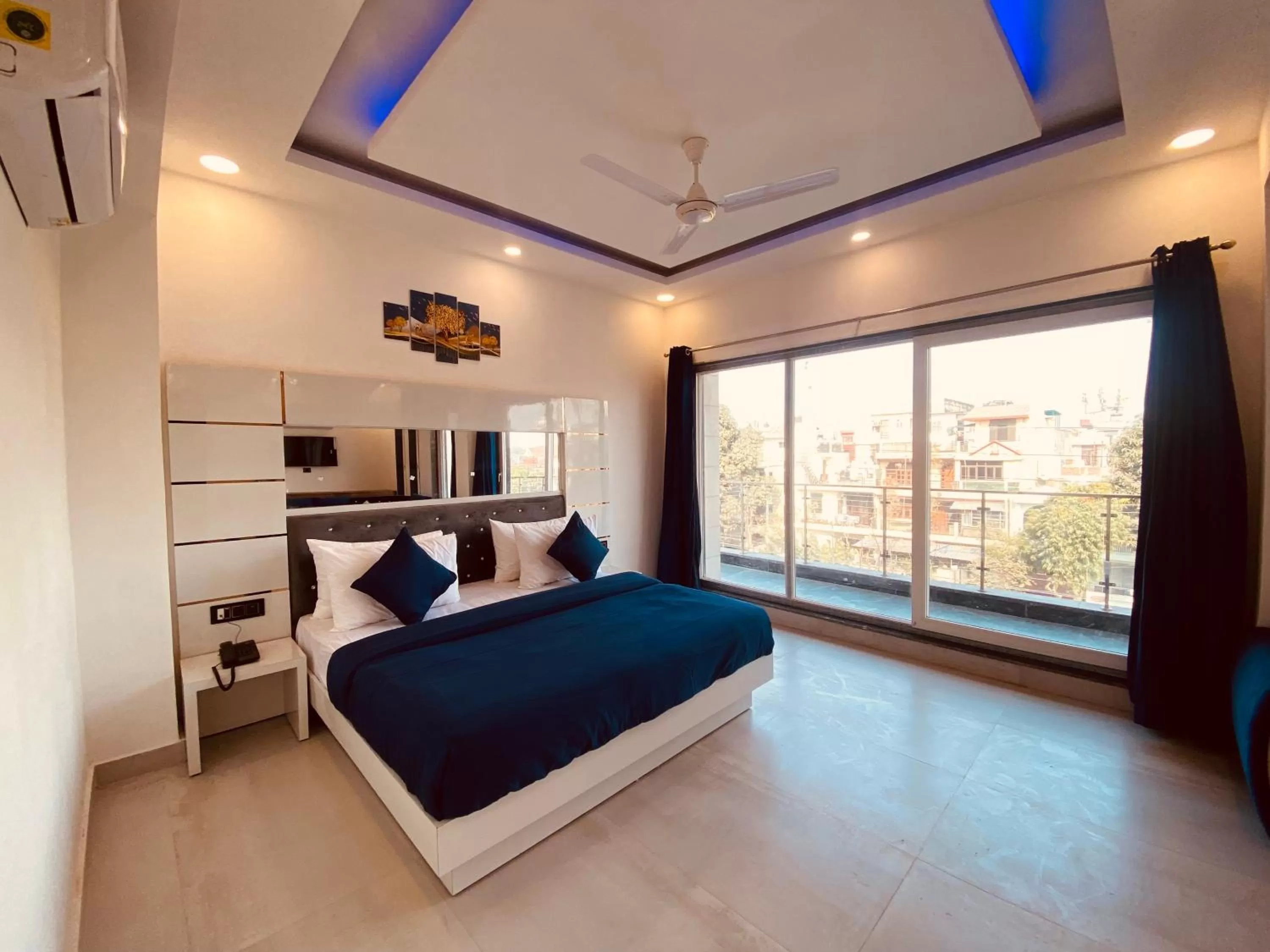 Bedroom in The Metro Stay By F9 Hotels-Near Sector 18 Metro Station Noida