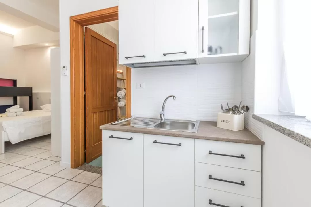 Kitchen/Kitchenette in La Gemma del Salento Rooms&Apartments