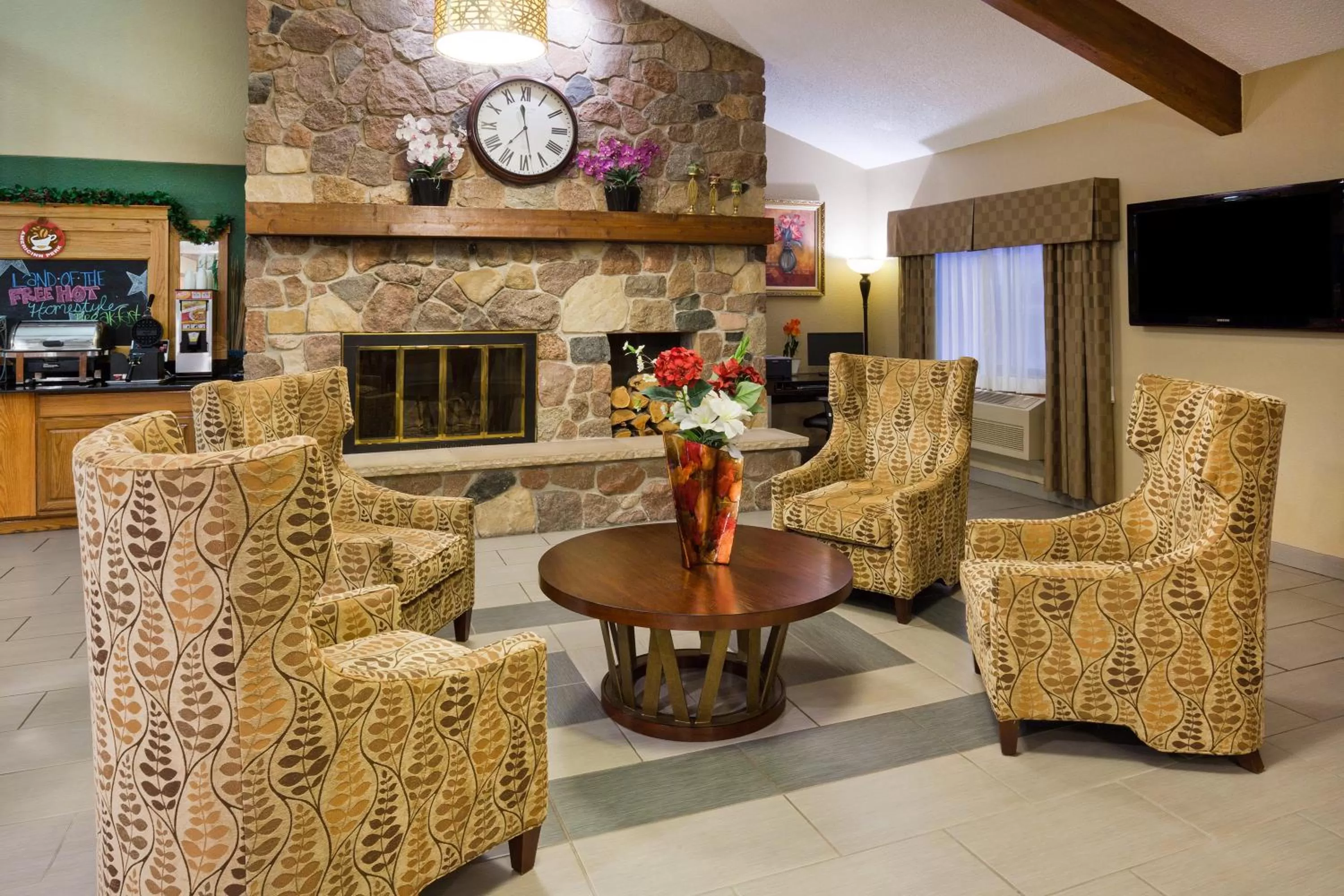 Lobby or reception in AmericInn by Wyndham Plover Stevens Point