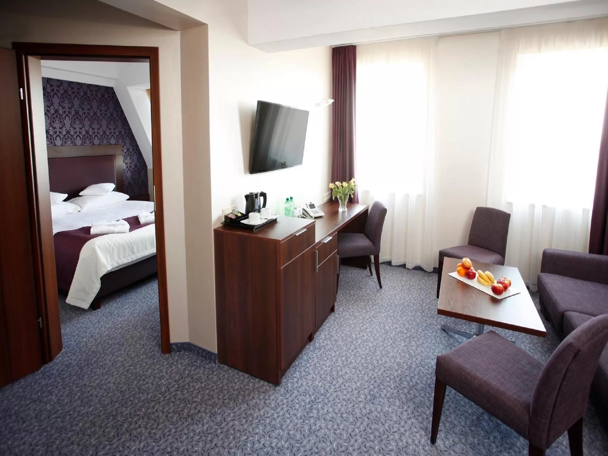 Communal lounge/ TV room, Bed in Hotel Zamek Centrum