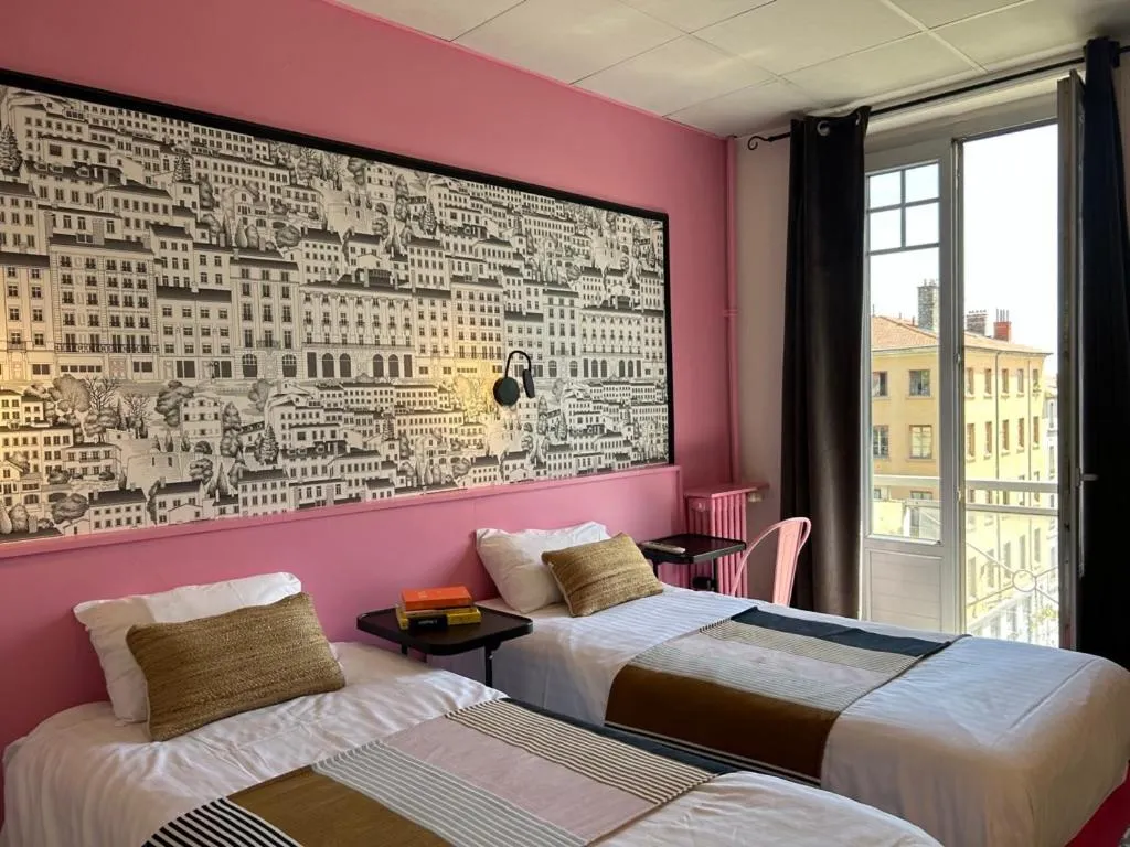 Bed in Hôtel de la Croix-Rousse