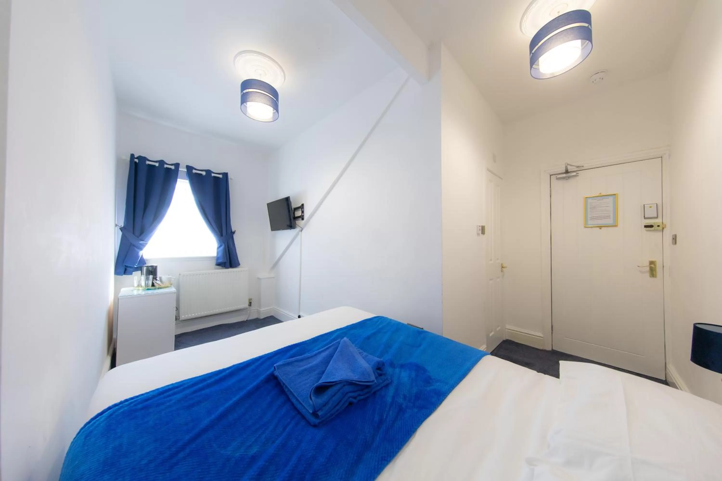 Bed in The Adonis Hotel