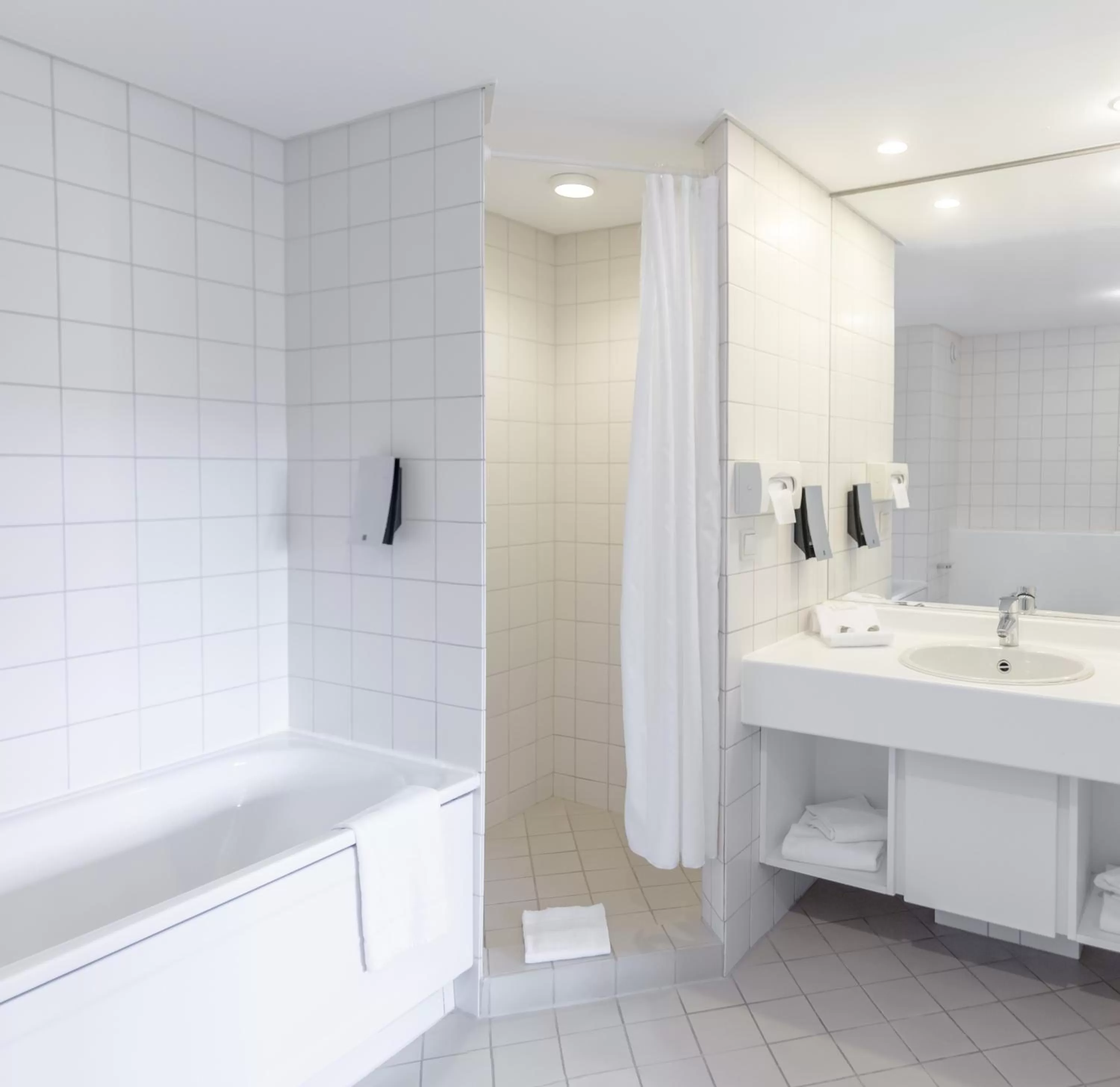 Bathroom in Ramada by Wyndham Flensburg City