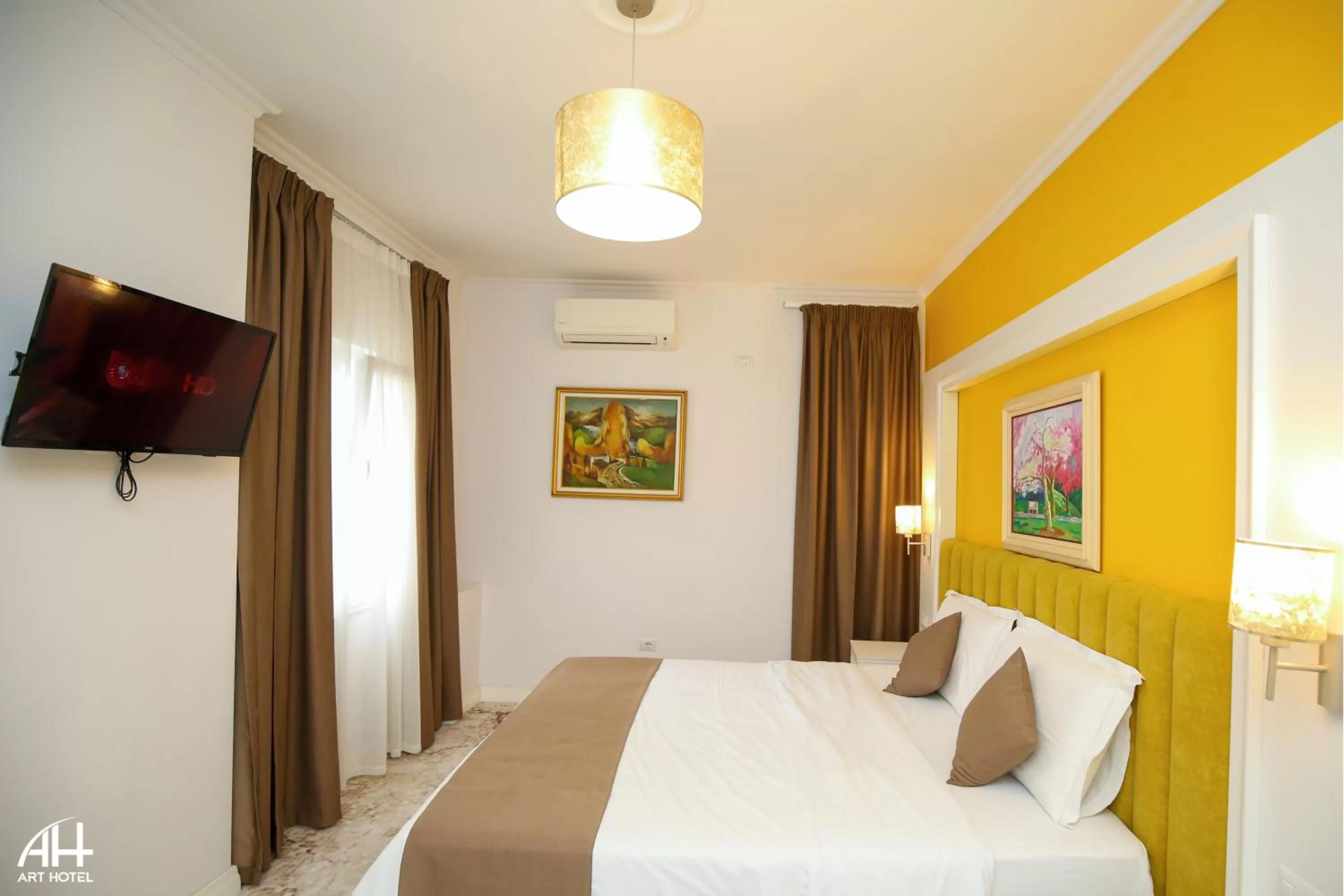 Bed in ART Hotel Tirana