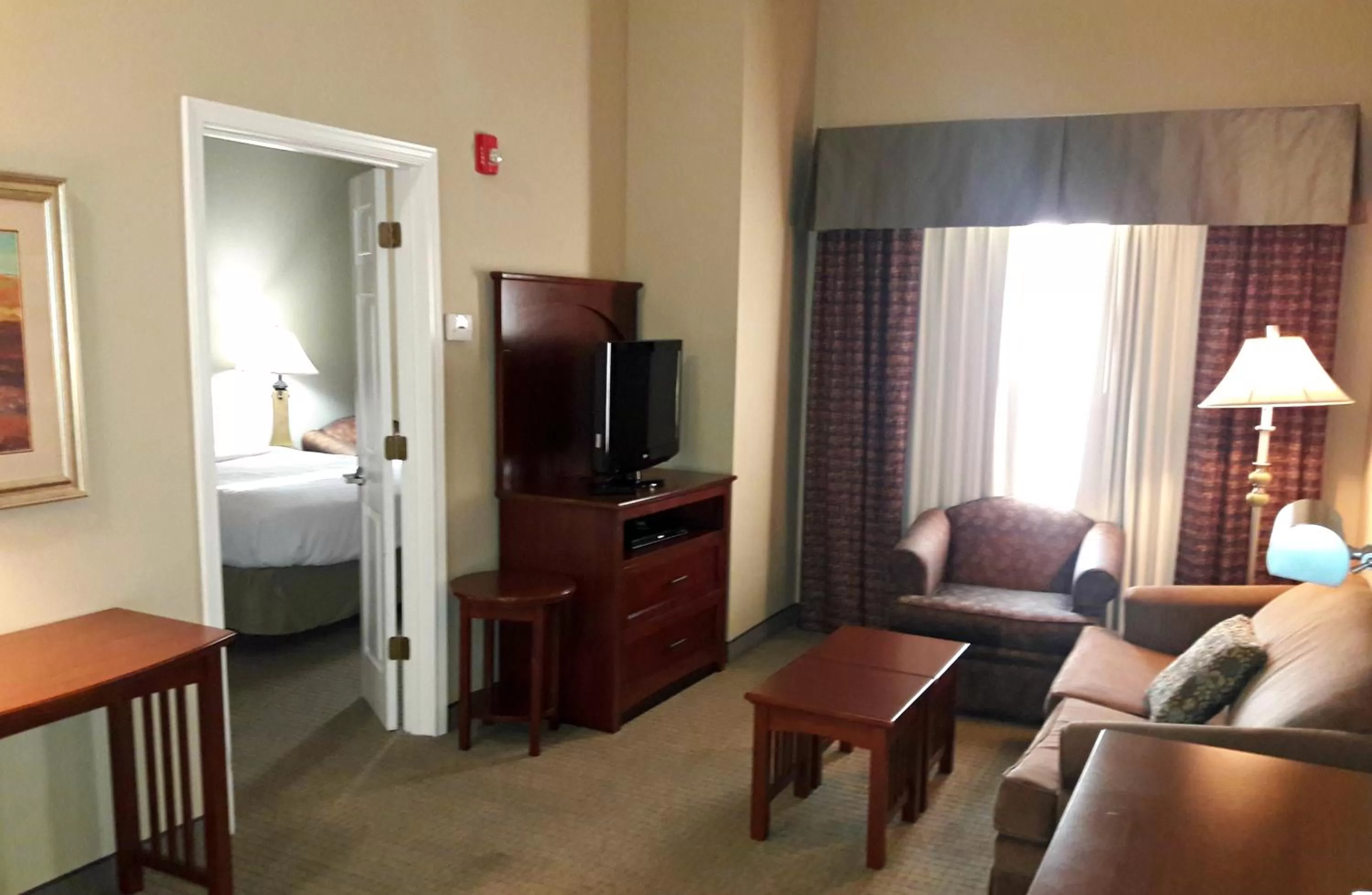 TV and multimedia, Bed in WeStay Suites - Covington/Mandeville