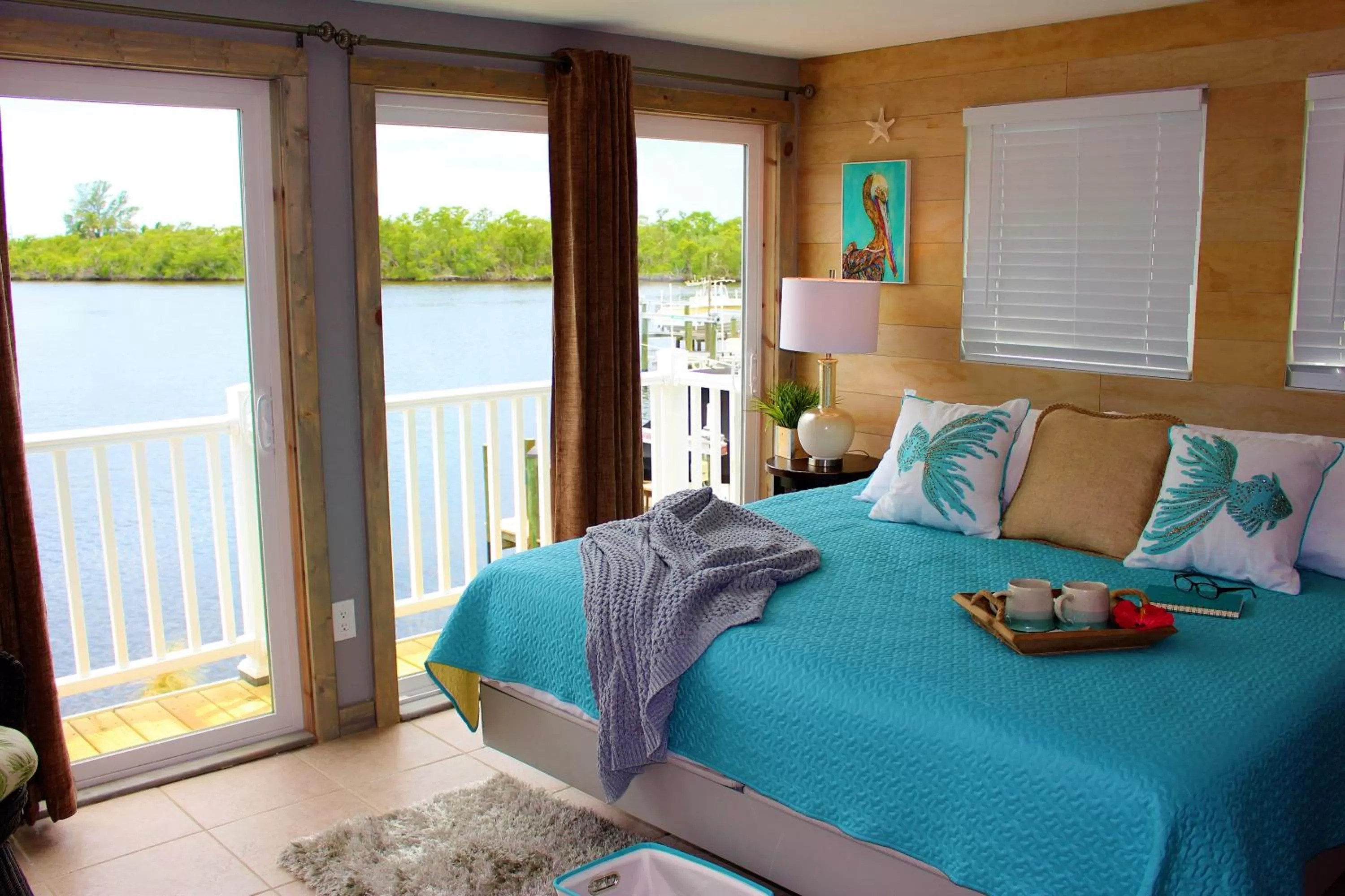 Grande Suite With Water View - Deck  in Latitude 26 Waterfront Boutique Resort - Bonita Springs