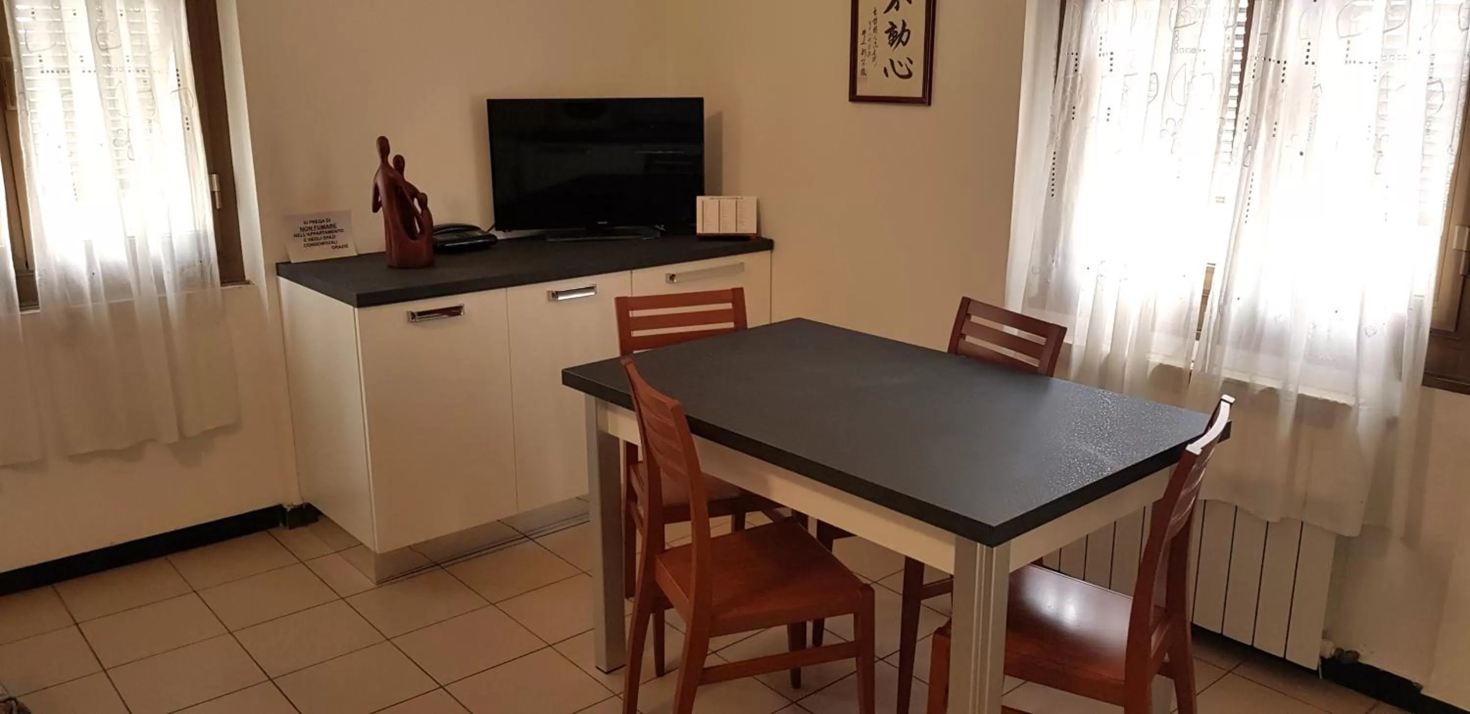 Communal lounge/ TV room in Coccodrillo Hotel & Apartments